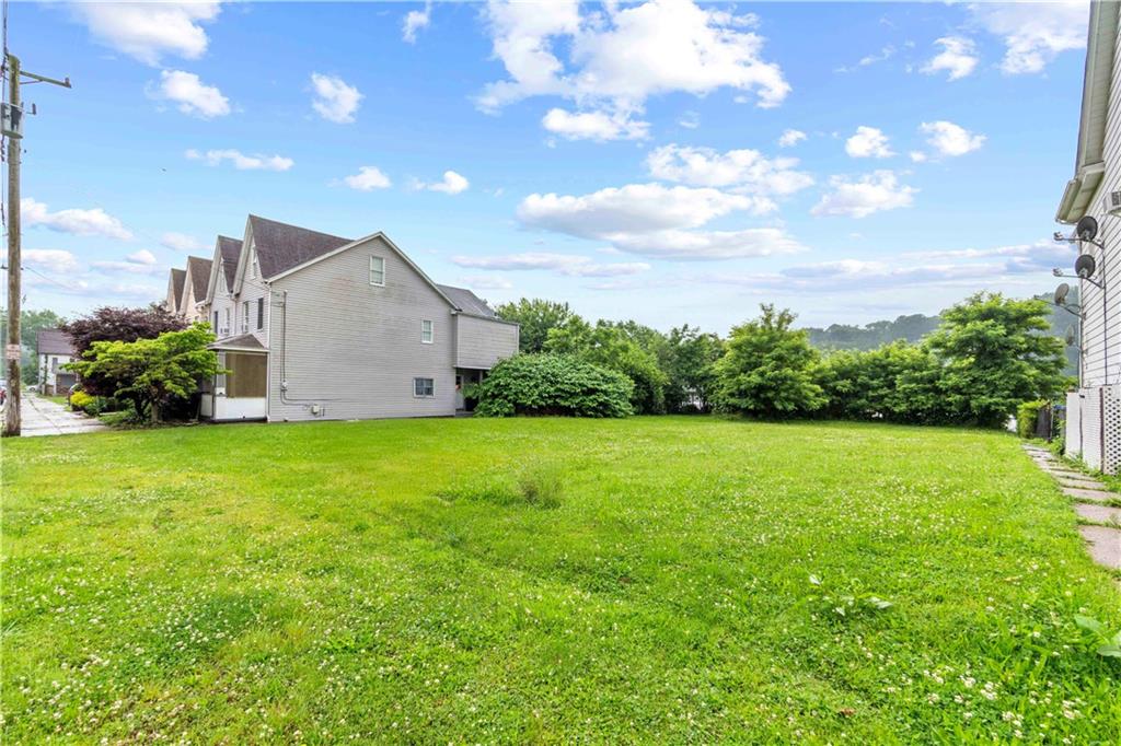 536 Penn Street Verona, PA 15147 - Photo 8 of 18 a view of a backyard with potted plants