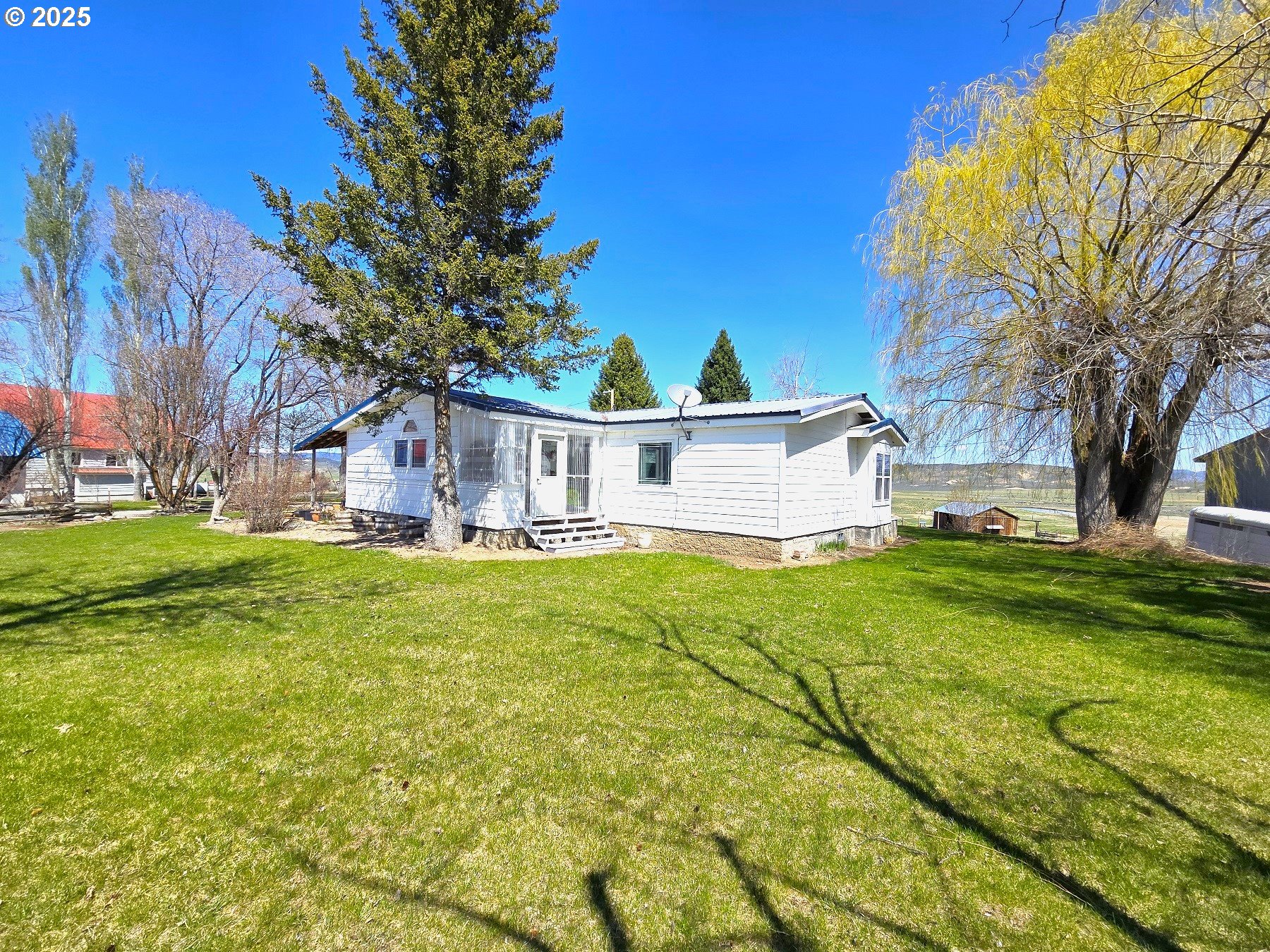 401 Main Street Unity, OR 97884 - Photo 1 of 46 a view of a house with a yard