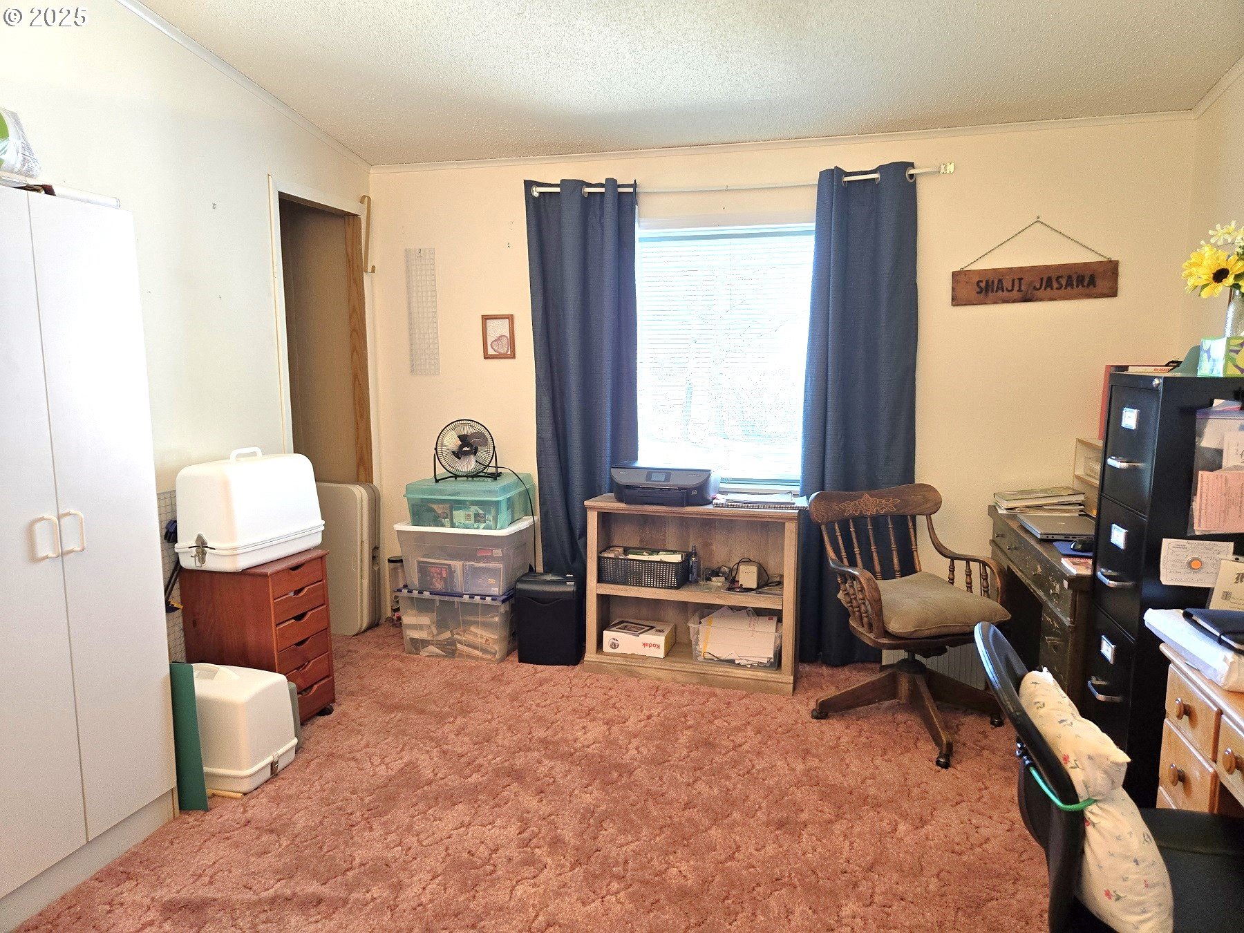 401 Main Street Unity, OR 97884 - Photo 16 of 46 a living room with furniture a window and a table