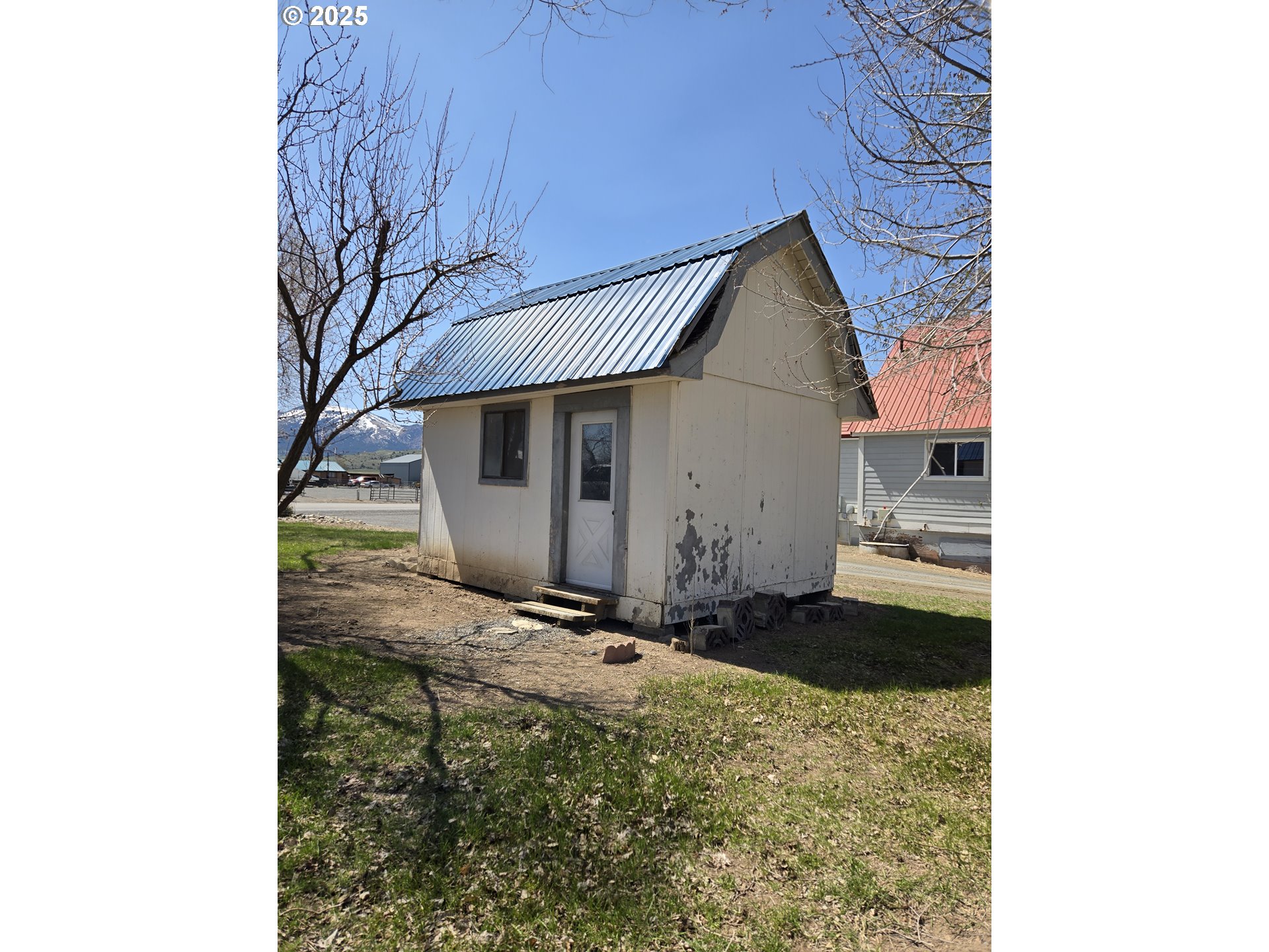 401 Main Street Unity, OR 97884 - Photo 17 of 46 a house view with a backyard