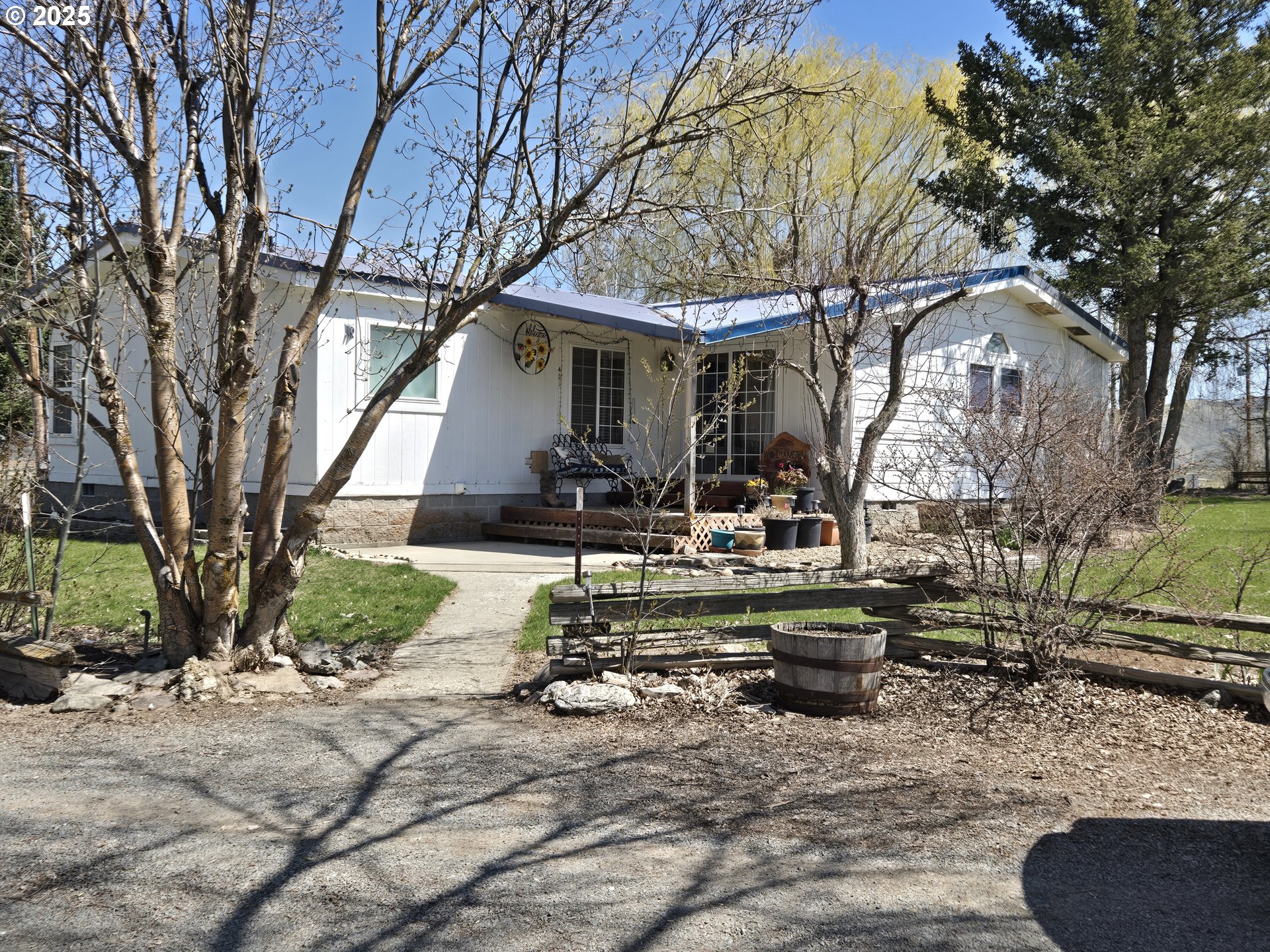 401 Main Street Unity, OR 97884 - Photo 3 of 46 a view of backyard of house with outdoor seating