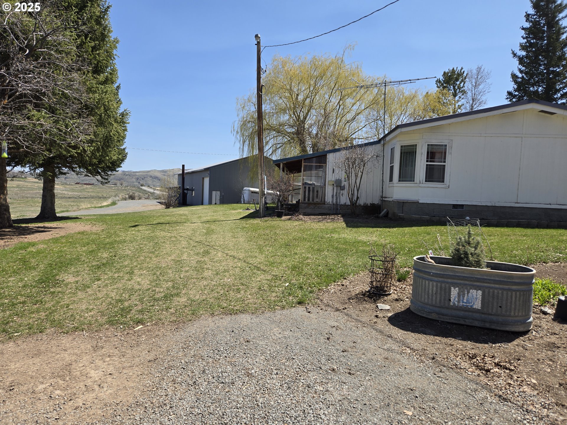 401 Main Street Unity, OR 97884 - Photo 4 of 46 a view of a house with a yard