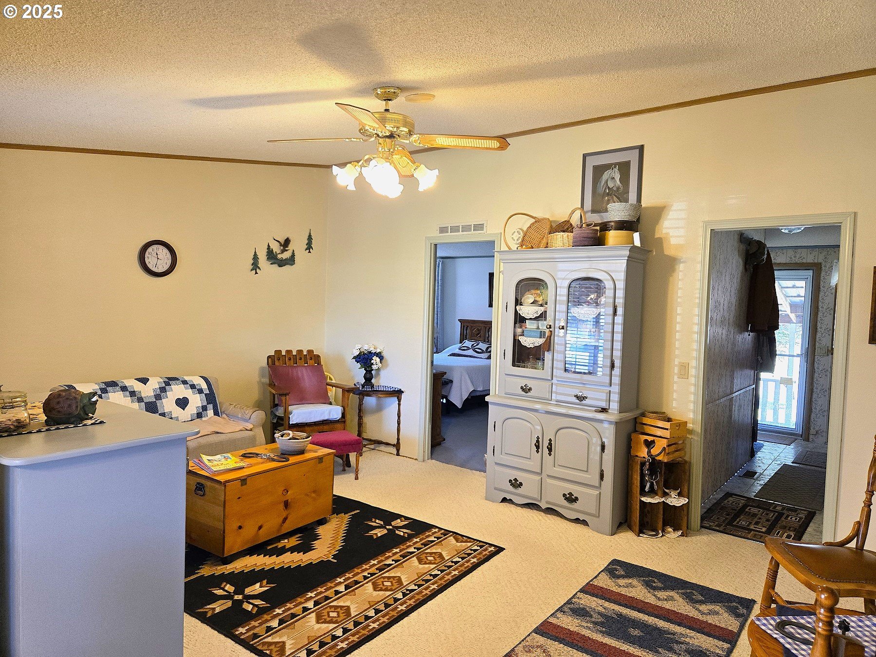 401 Main Street Unity, OR 97884 - Photo 10 of 46 a living room with furniture and a flat screen tv