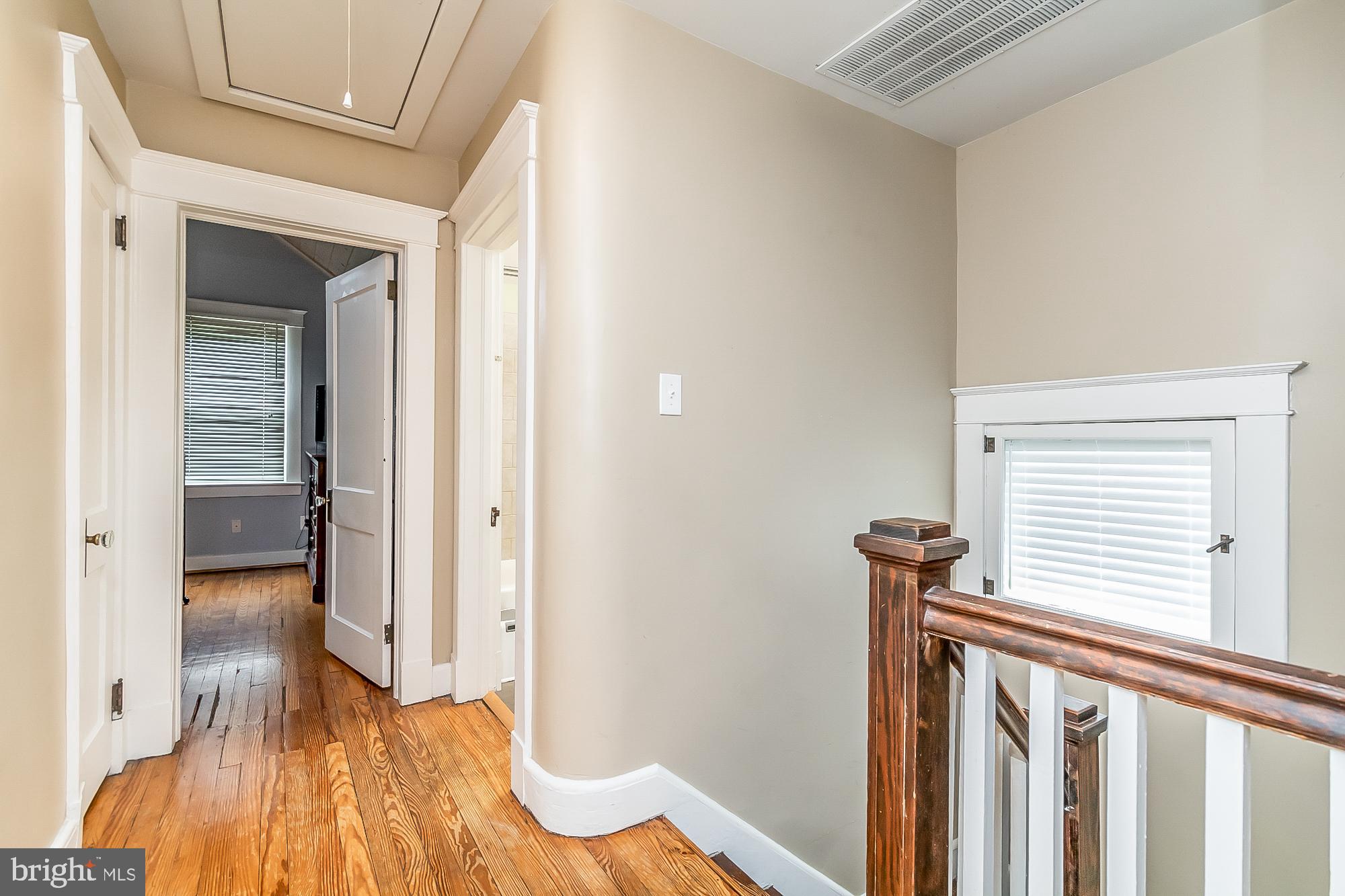714 Hollen Road Baltimore, MD 21212 - Photo 23 of 36 Upstairs hallway with attic access