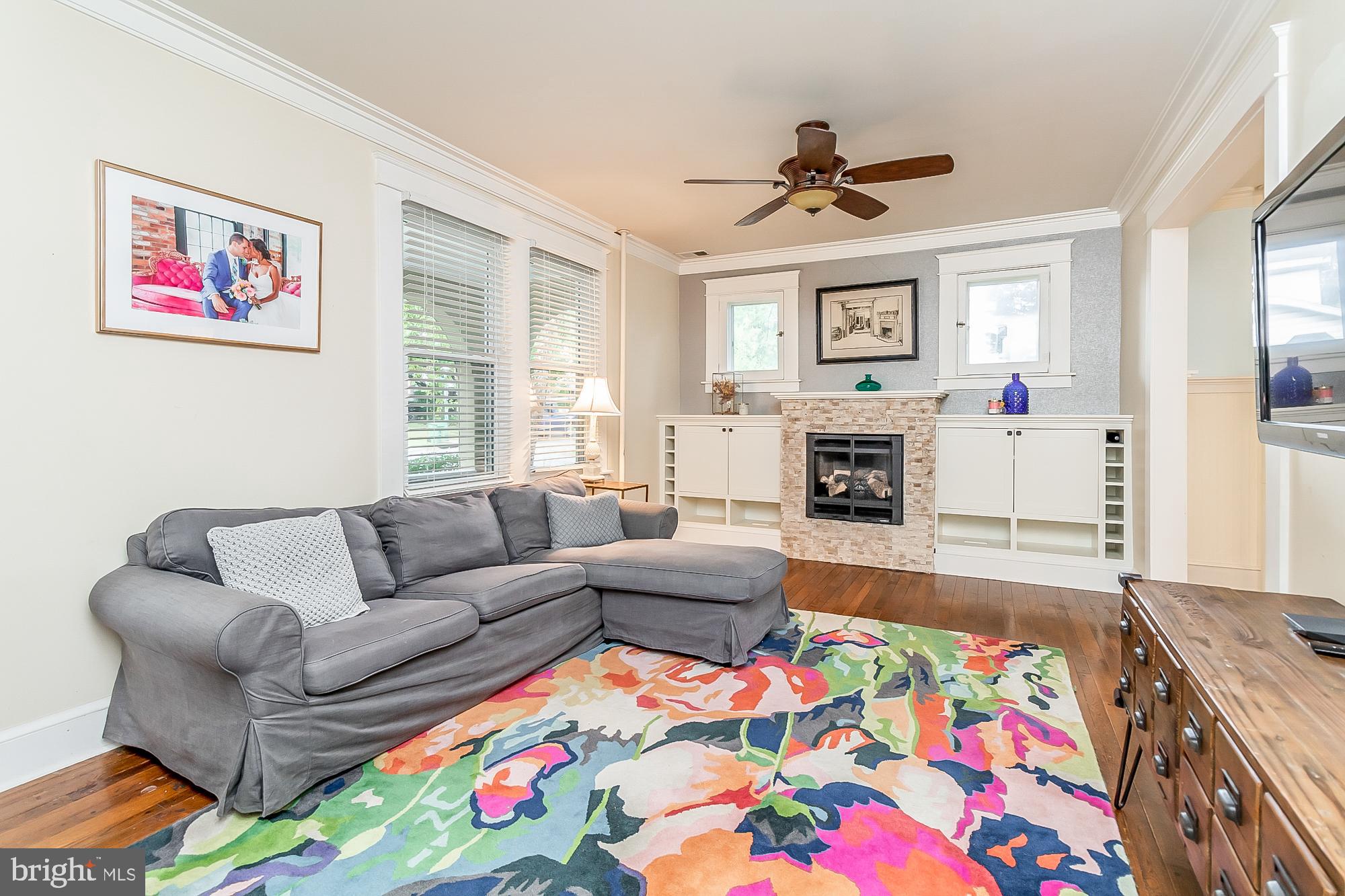 714 Hollen Road Baltimore, MD 21212 - Photo 5 of 36 Open living room with fireplace