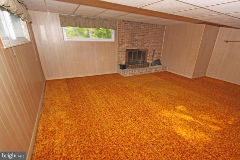 5648 Inverchapel Road Springfield, VA 22151 - Photo 29 of 30 a view of empty room with a fireplace