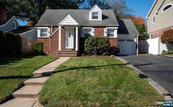 front view of house with a yard
