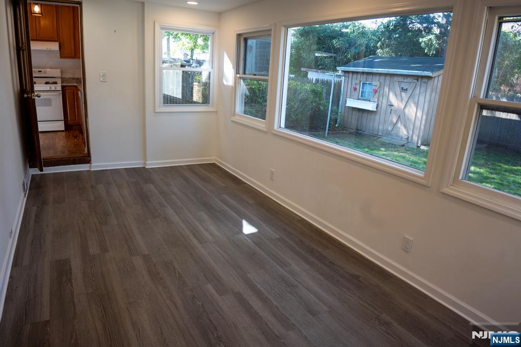 58 Elm Street Dumont, NJ 07628 - Photo 14 of 28 a view of an entryway with wooden floor