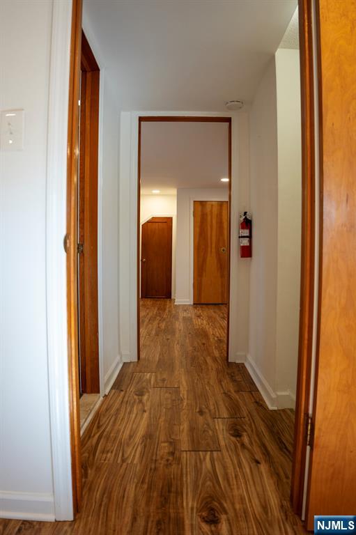 58 Elm Street Dumont, NJ 07628 - Photo 20 of 28 a view of hallway with wooden floor