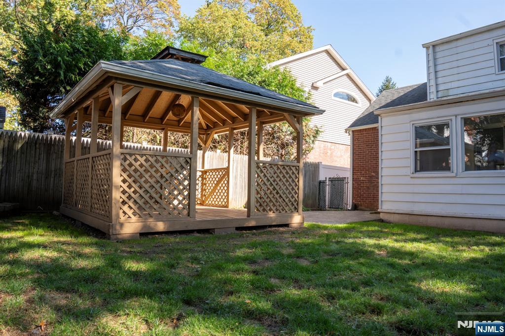 58 Elm Street Dumont, NJ 07628 - Photo 26 of 28 a view of a house with a yard