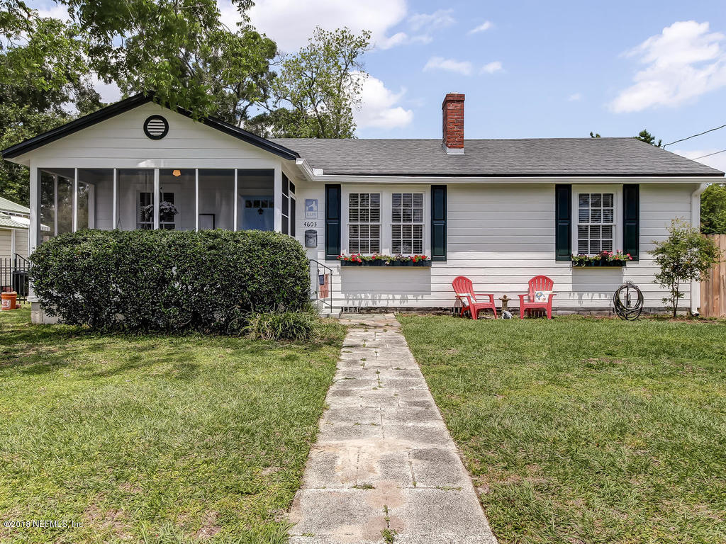 4603 Birkenhead Road Jacksonville, FL 32210 - Photo 1 of 43 a front view of a house with yard and green space