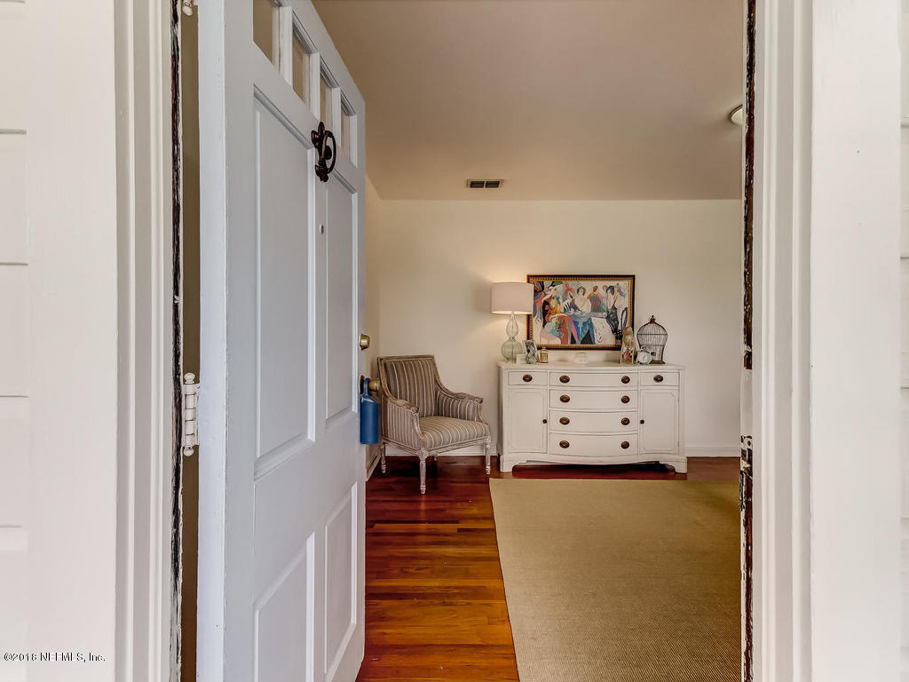 4603 Birkenhead Road Jacksonville, FL 32210 - Photo 7 of 43 a view of a hallway with couches