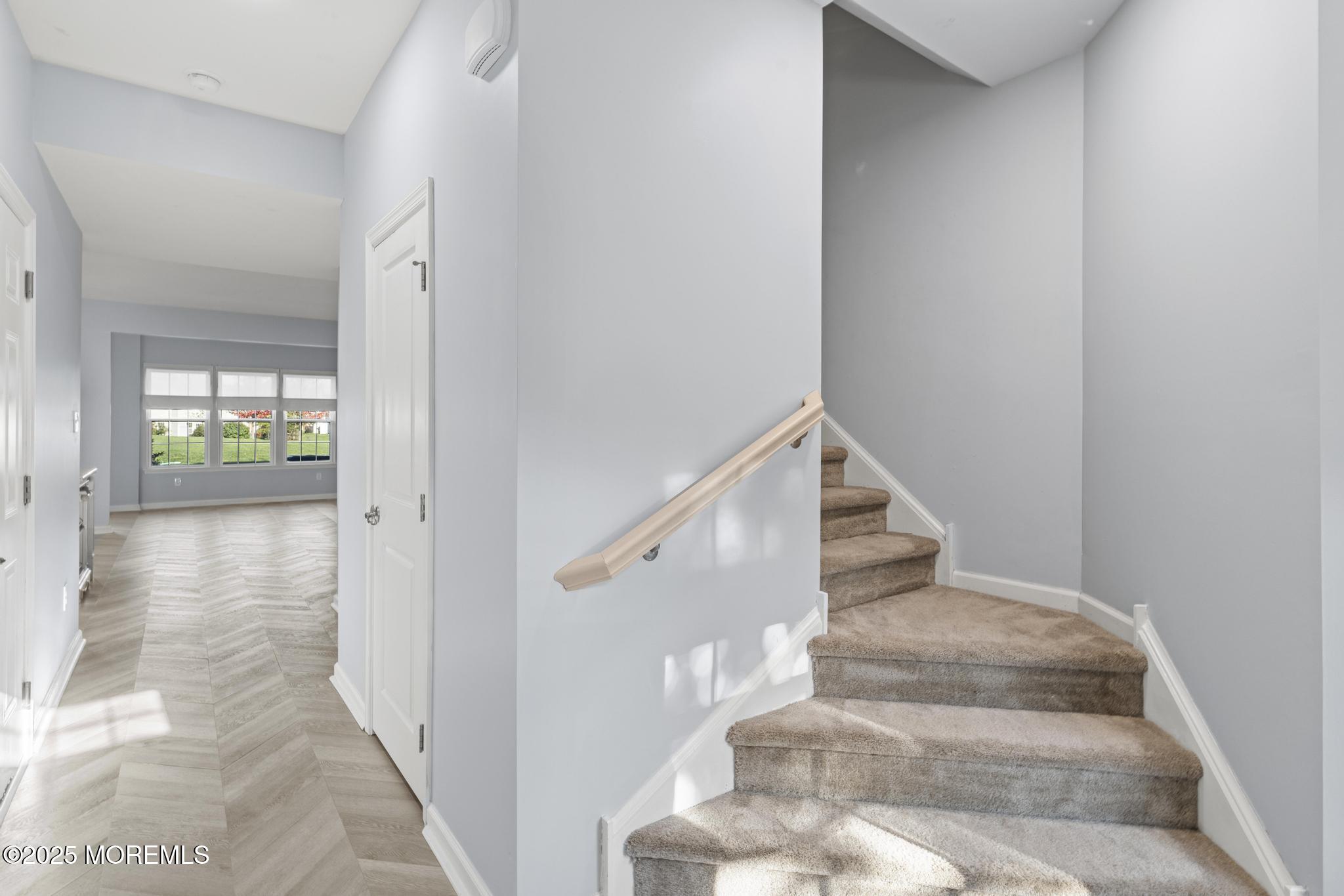 125 Sundance Drive Hamilton, NJ 08619 - Photo 11 of 31 a view of entryway and hall with wooden floor