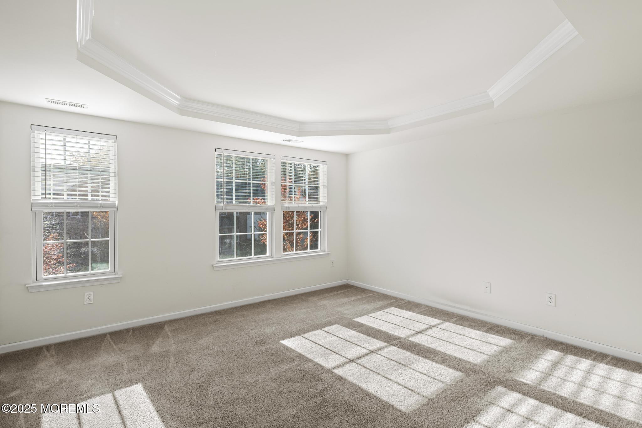 125 Sundance Drive Hamilton, NJ 08619 - Photo 13 of 31 a view of an empty room with a window