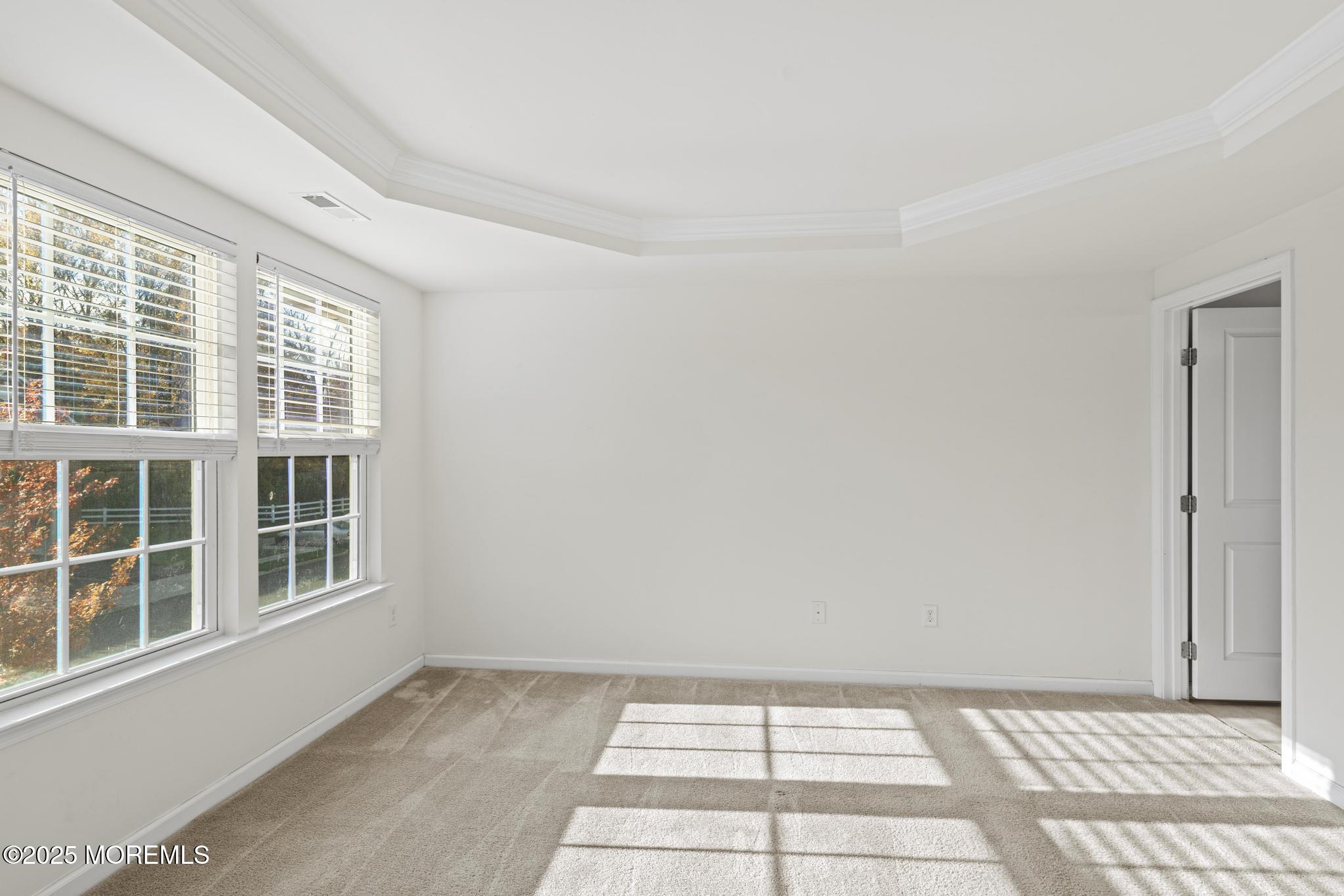 125 Sundance Drive Hamilton, NJ 08619 - Photo 14 of 31 a view of an empty room with a window