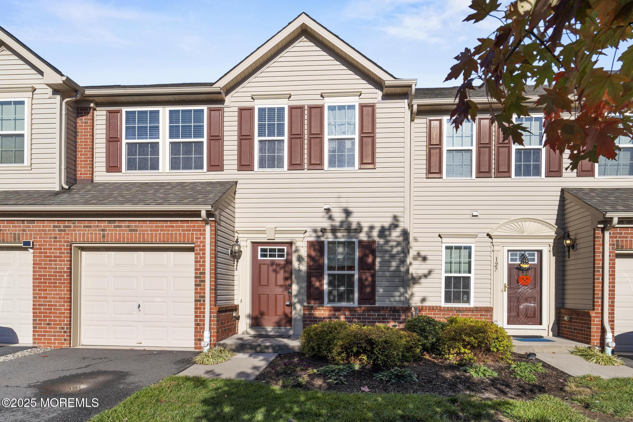 125 Sundance Drive Hamilton, NJ 08619 - Photo 27 of 31 a view of a house with a yard and potted plants