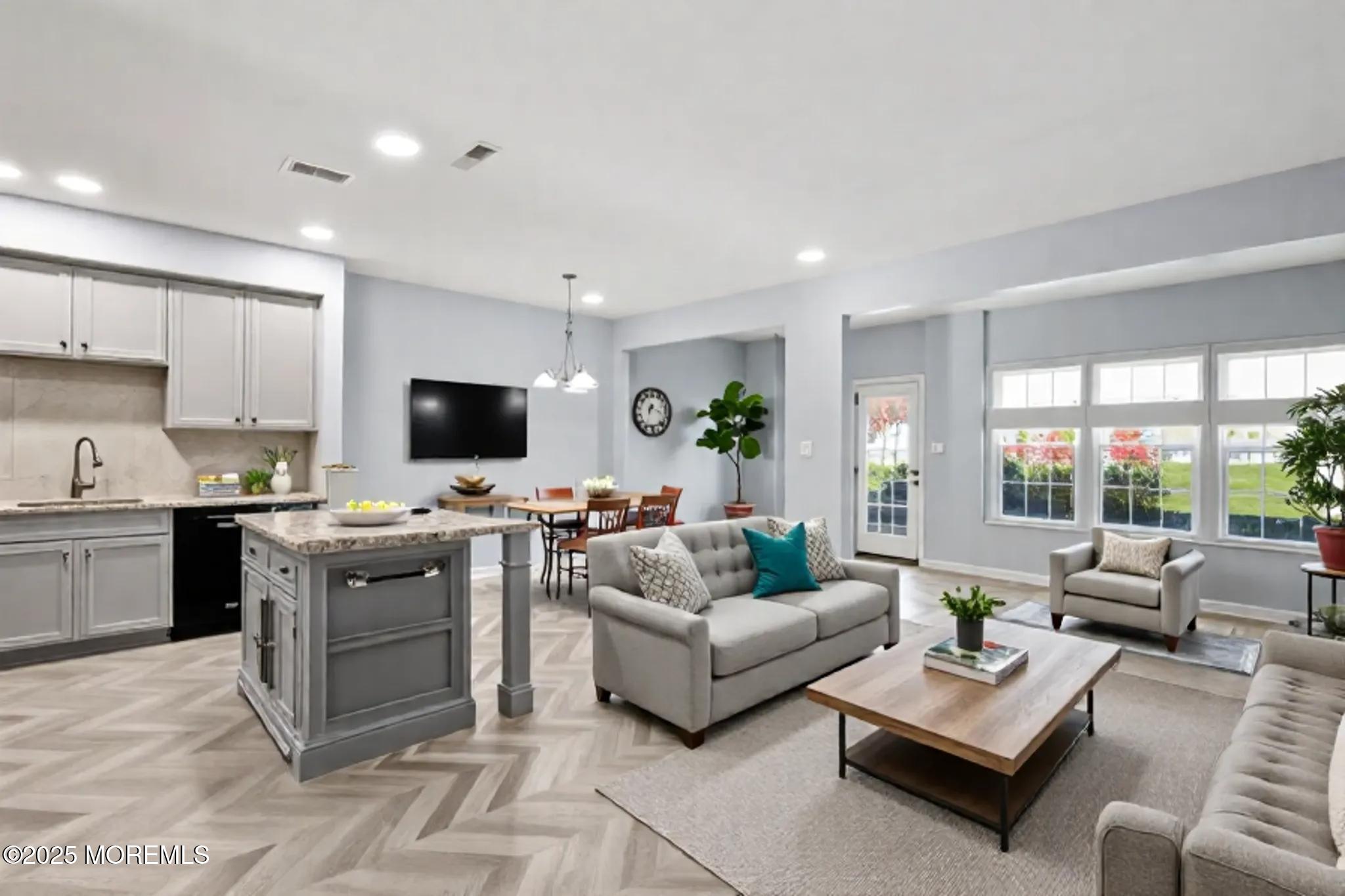125 Sundance Drive Hamilton, NJ 08619 - Photo 3 of 31 a living room with furniture and a flat screen tv