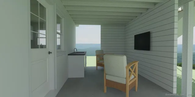 a view of a livingroom with furniture