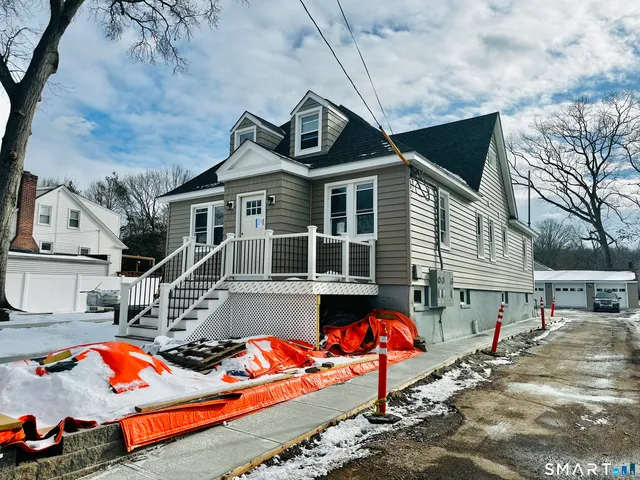 swimming pool with an outdoor seating