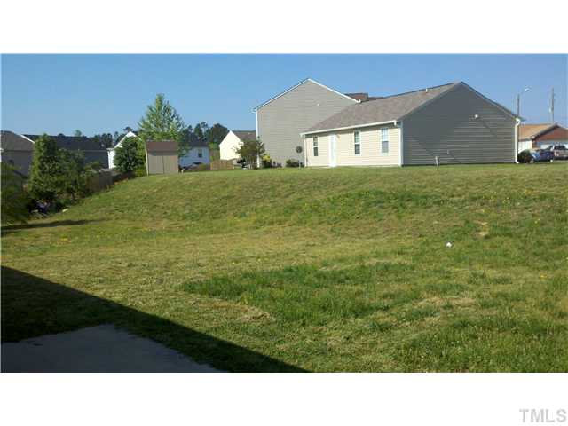 4121 Springfield Creek Drive Raleigh, NC 27616 - Photo 6 of 6 BACKYARD BACKS UP TO OPEN COMMON AREA...