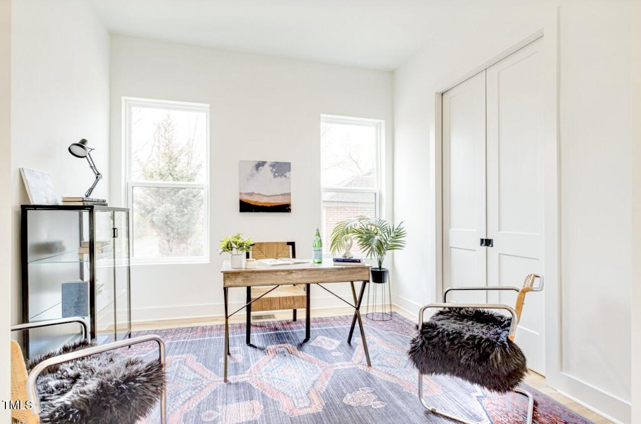 322 South Dixon Avenue, Unit R Cary, NC 27511 - Photo 20 of 37 a living room with furniture and a window