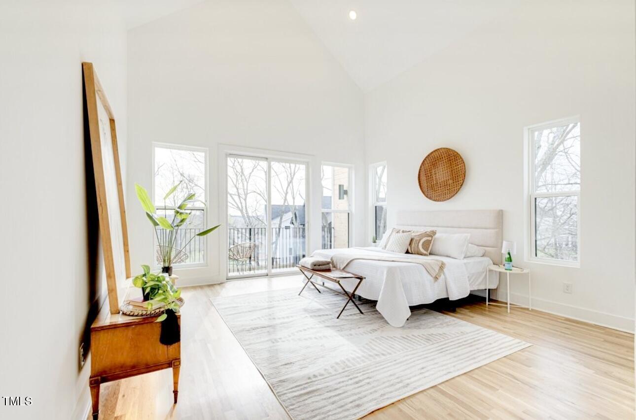 322 South Dixon Avenue, Unit R Cary, NC 27511 - Photo 22 of 37 a living room with furniture and a large window