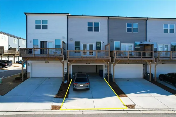 a front view of a building with street view