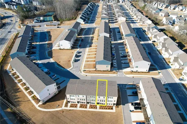 a view of a chairs and table in the patio
