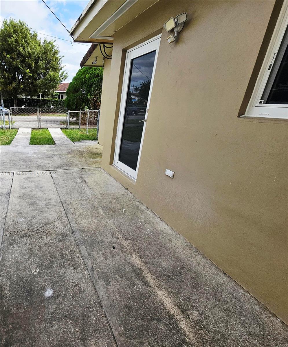 a view of swimming pool with a patio and a yard