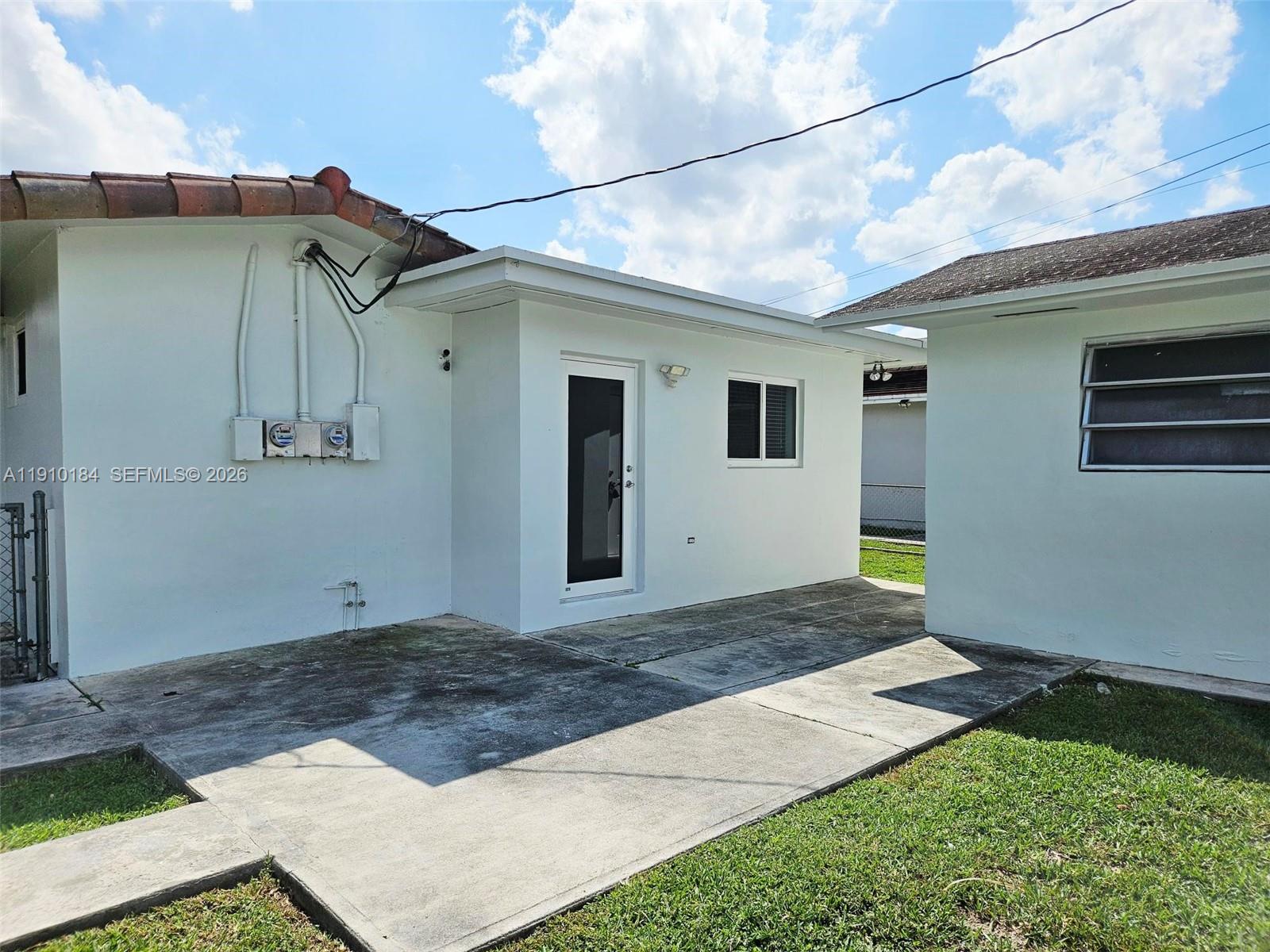 9301 Southwest 37th Street, Unit 4 Miami, FL 33165 - Photo 3 of 10 a front view of a house