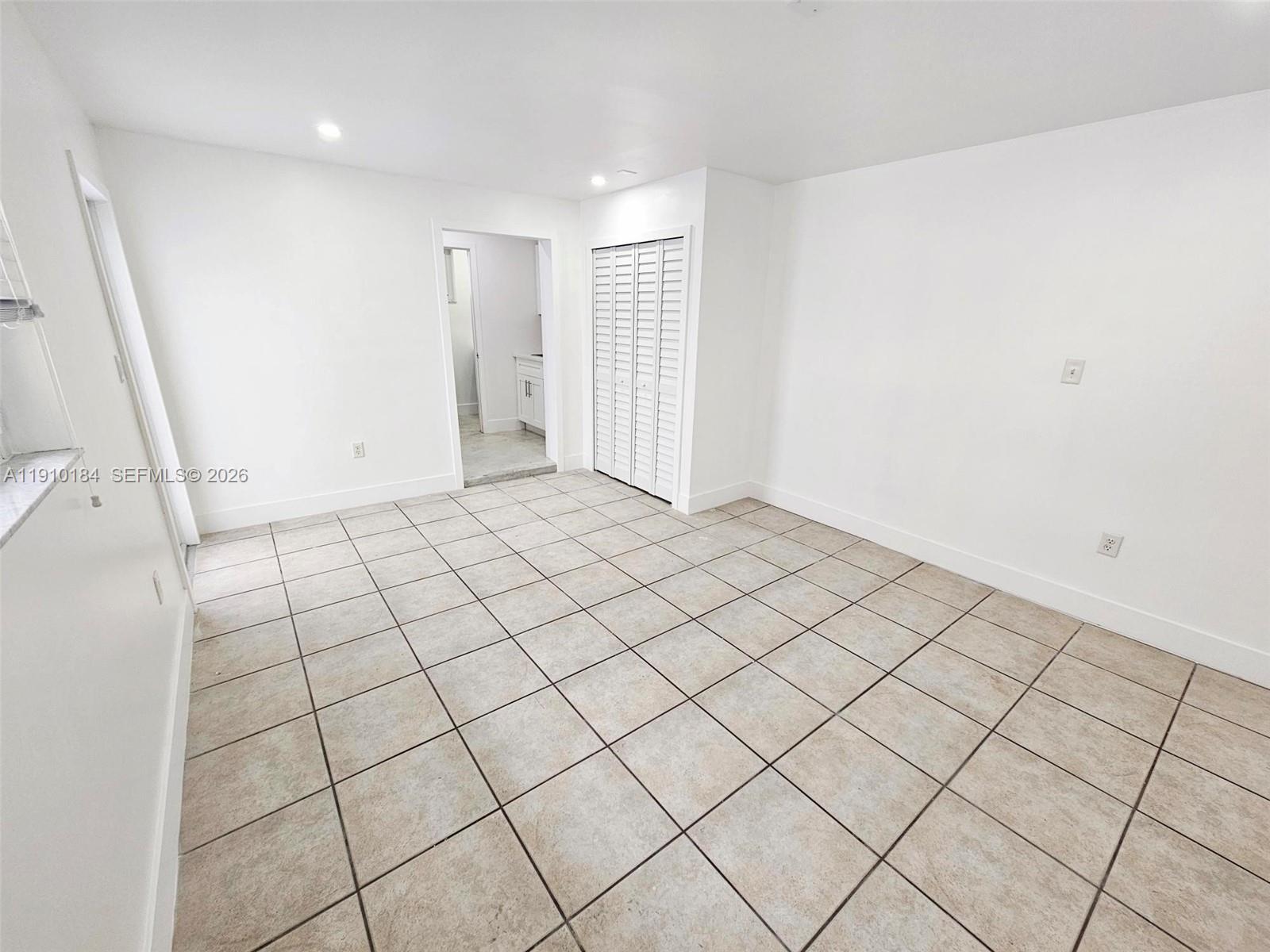 9301 Southwest 37th Street, Unit 4 Miami, FL 33165 - Photo 5 of 10 a view of an empty room