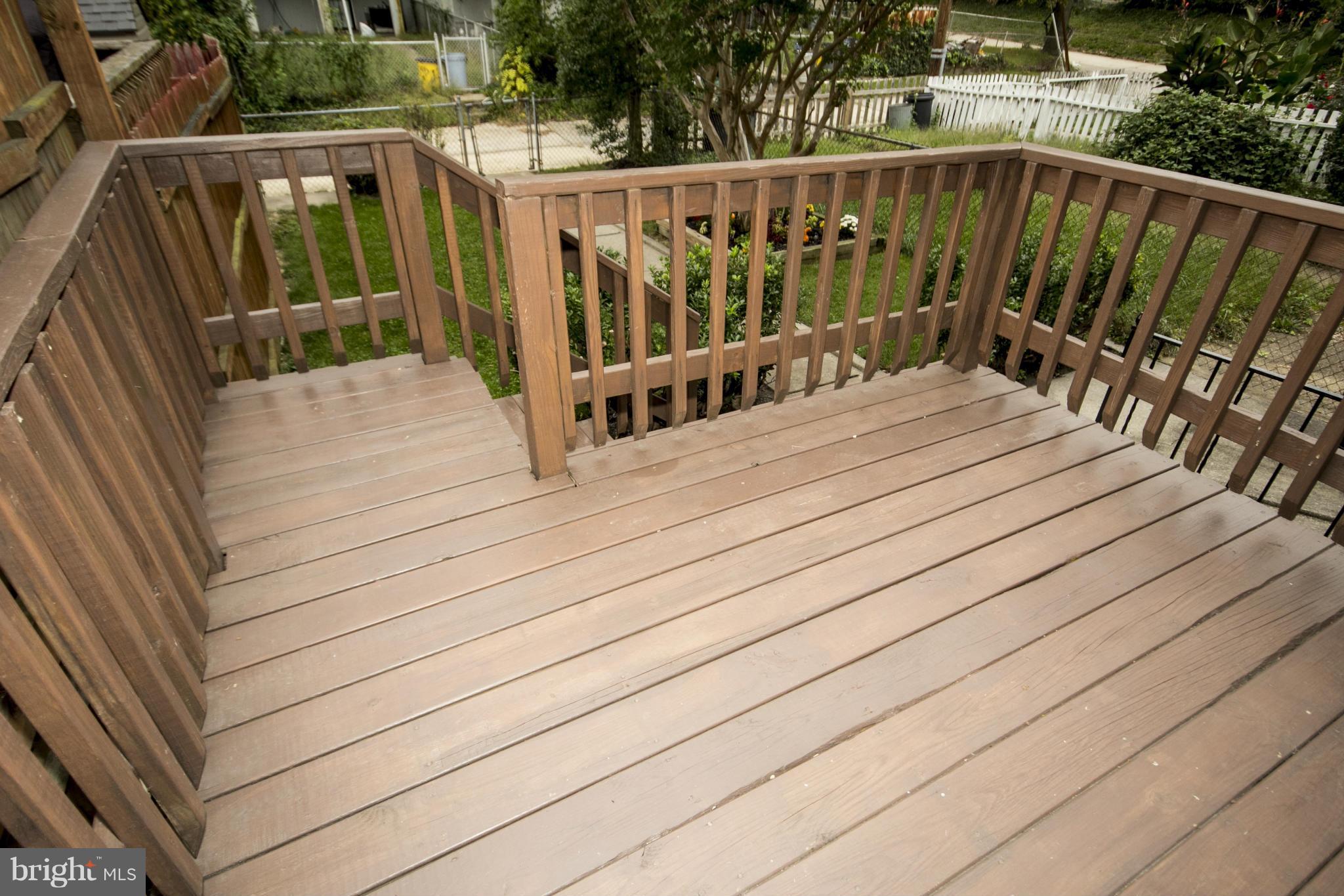 5626 Sagra Road Baltimore, MD 21239 - Photo 18 of 27 a view of balcony with wooden floor