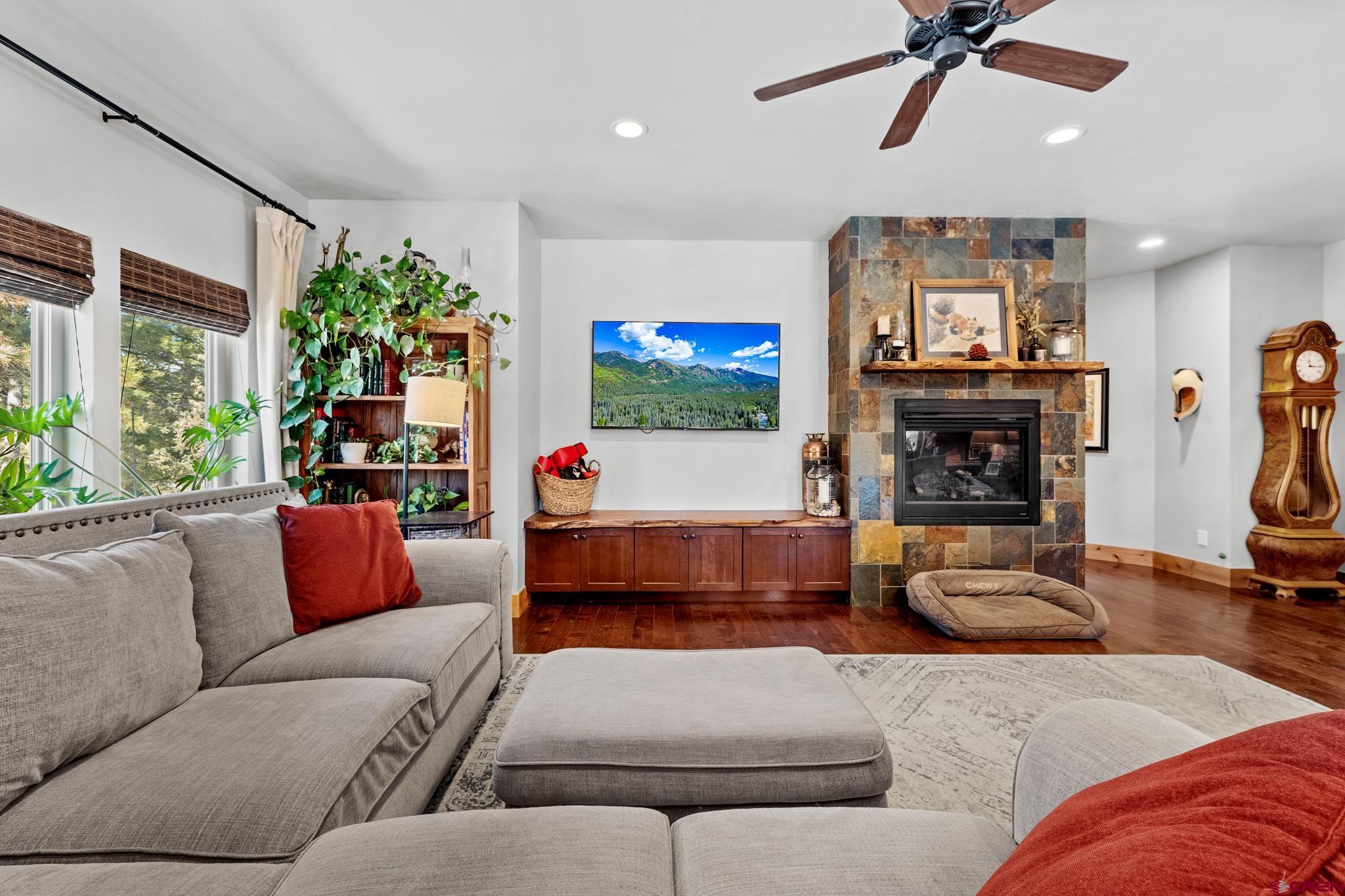 51 West Fork Road Durango, CO 81303 - Photo 13 of 35 a living room with furniture and a flat screen tv
