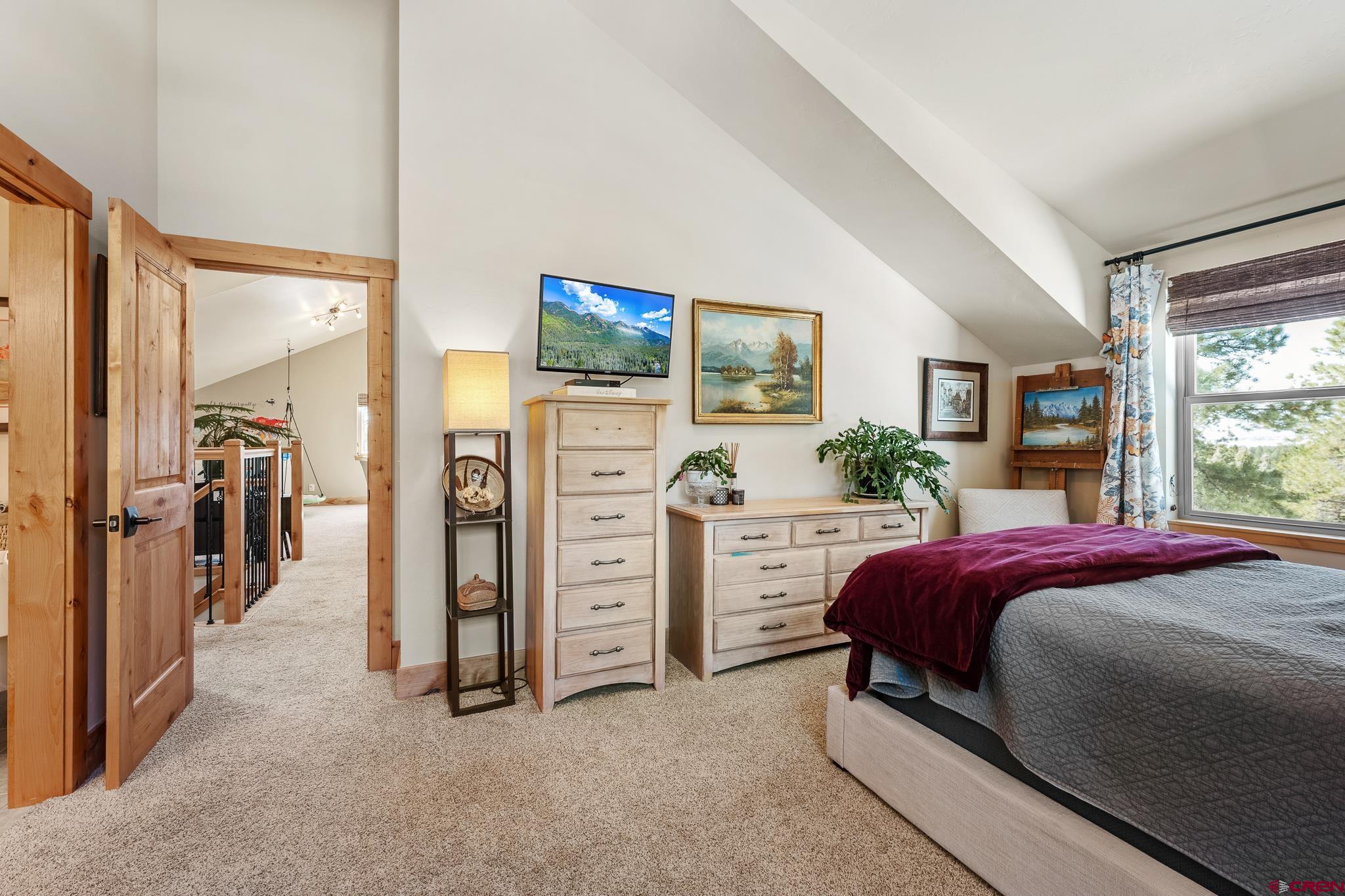 51 West Fork Road Durango, CO 81303 - Photo 24 of 35 a bedroom with a bed and a dresser