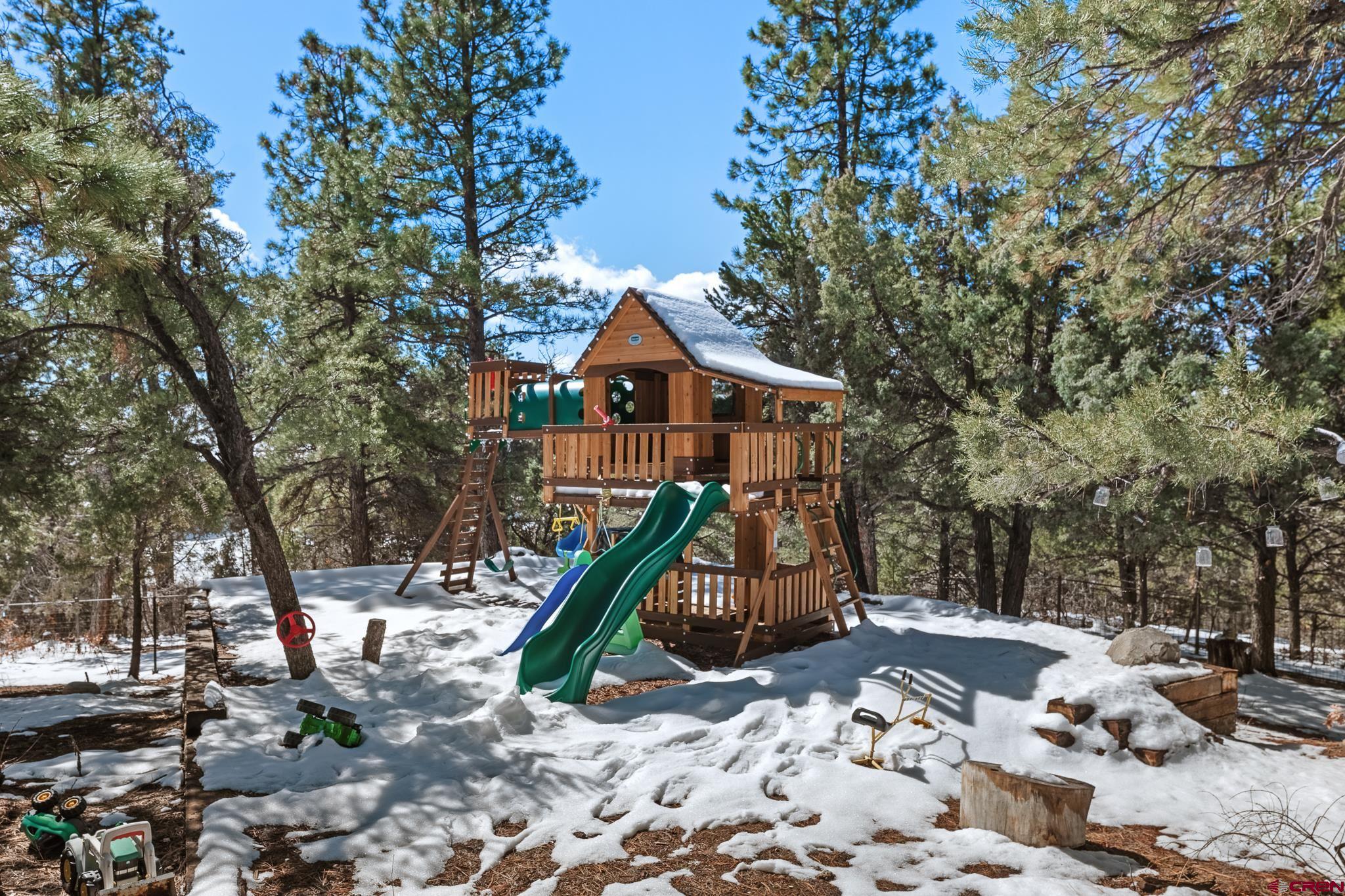 51 West Fork Road Durango, CO 81303 - Photo 33 of 35 a front view of a house with a park