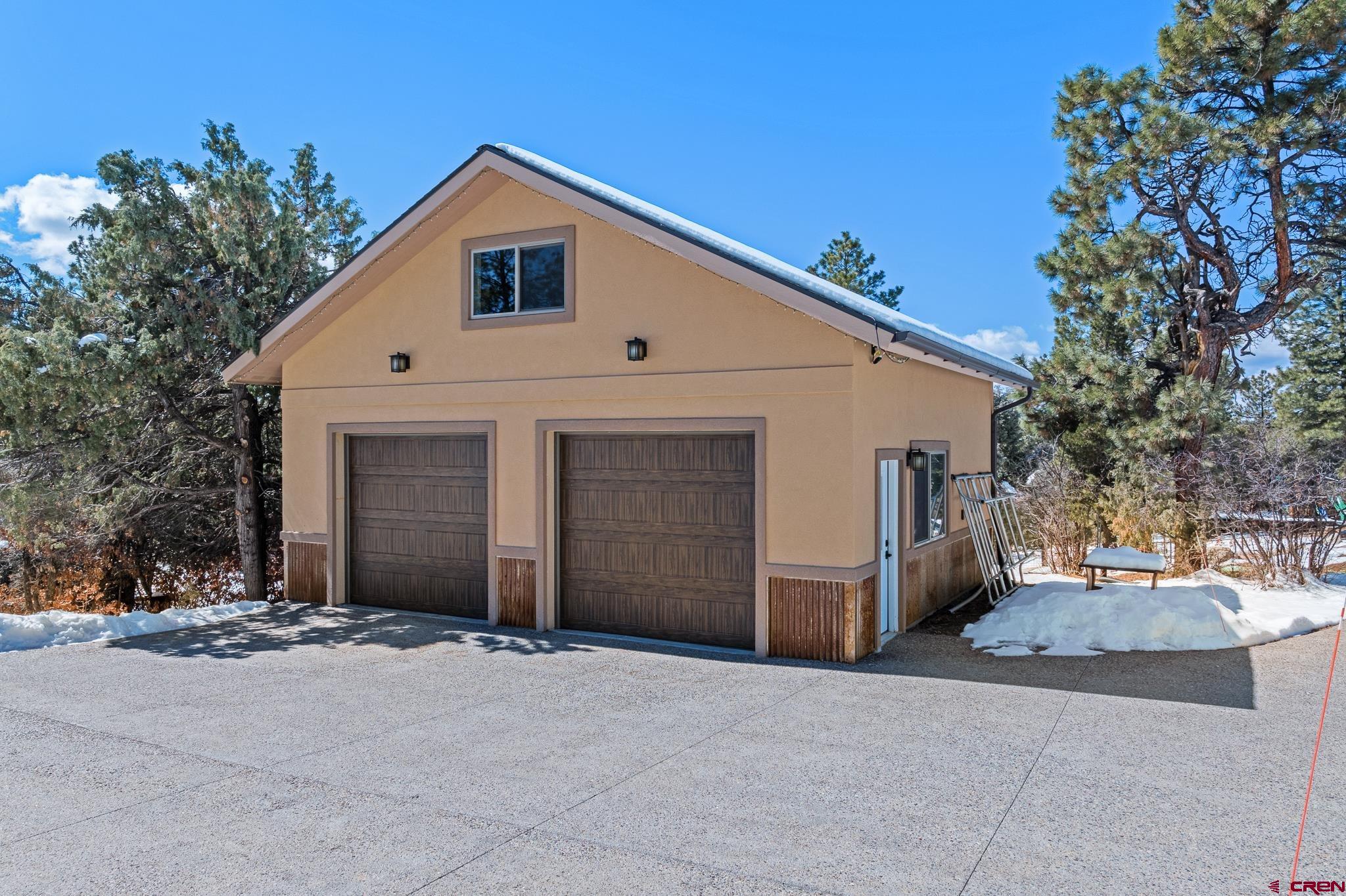 51 West Fork Road Durango, CO 81303 - Photo 5 of 35 a front view of a house with a yard