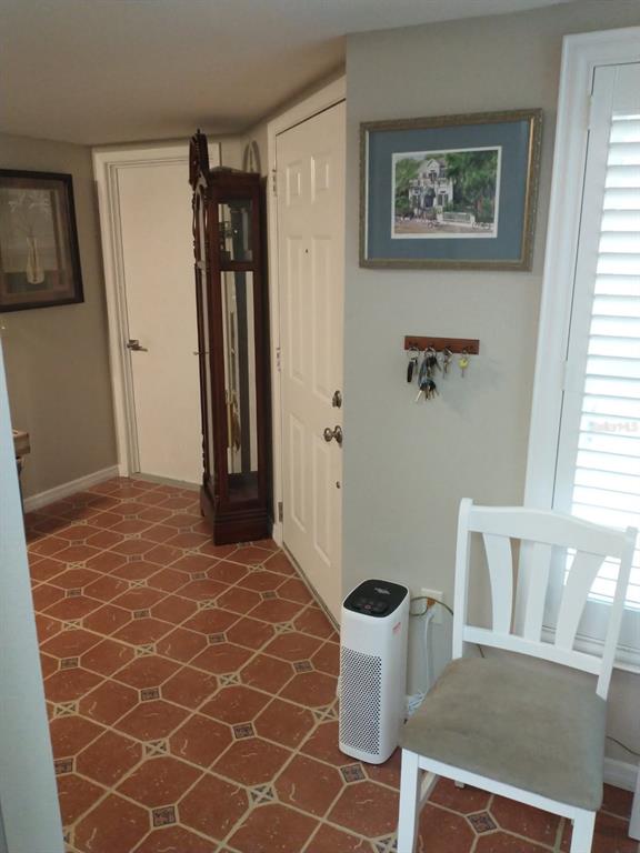 11541 Orleans Lane Port Richey, FL 34668 - Photo 11 of 24 a view of an empty room with a window