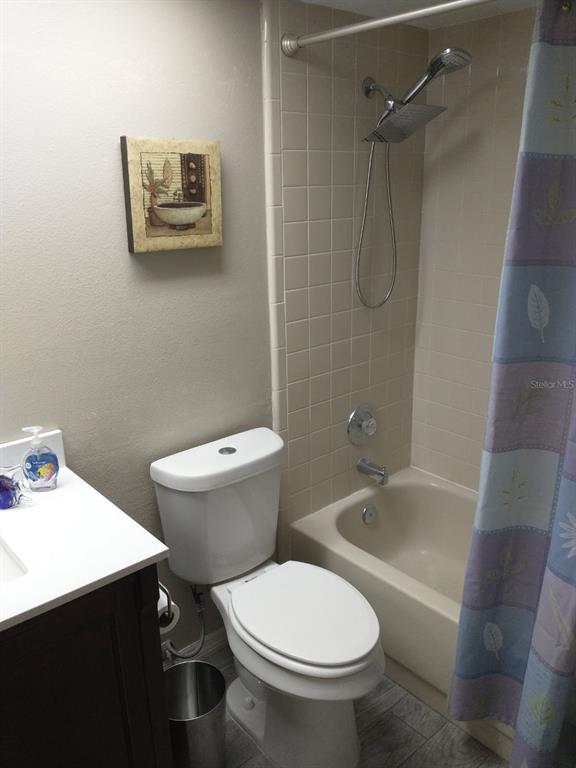 11541 Orleans Lane Port Richey, FL 34668 - Photo 16 of 24 a white toilet sitting next to a bath tub