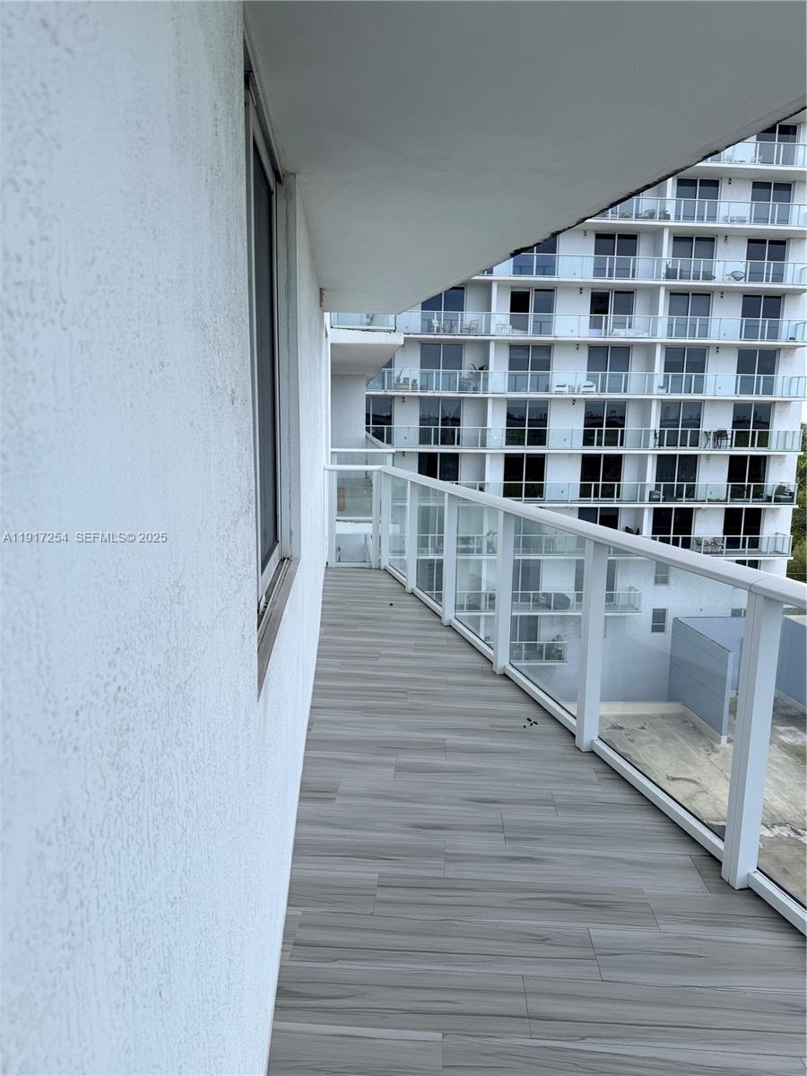 4250 Biscayne Boulevard, Unit 902 Miami, FL 33137 - Photo 23 of 30 a hallway with windows