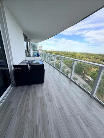 a bedroom with a bed and a desk