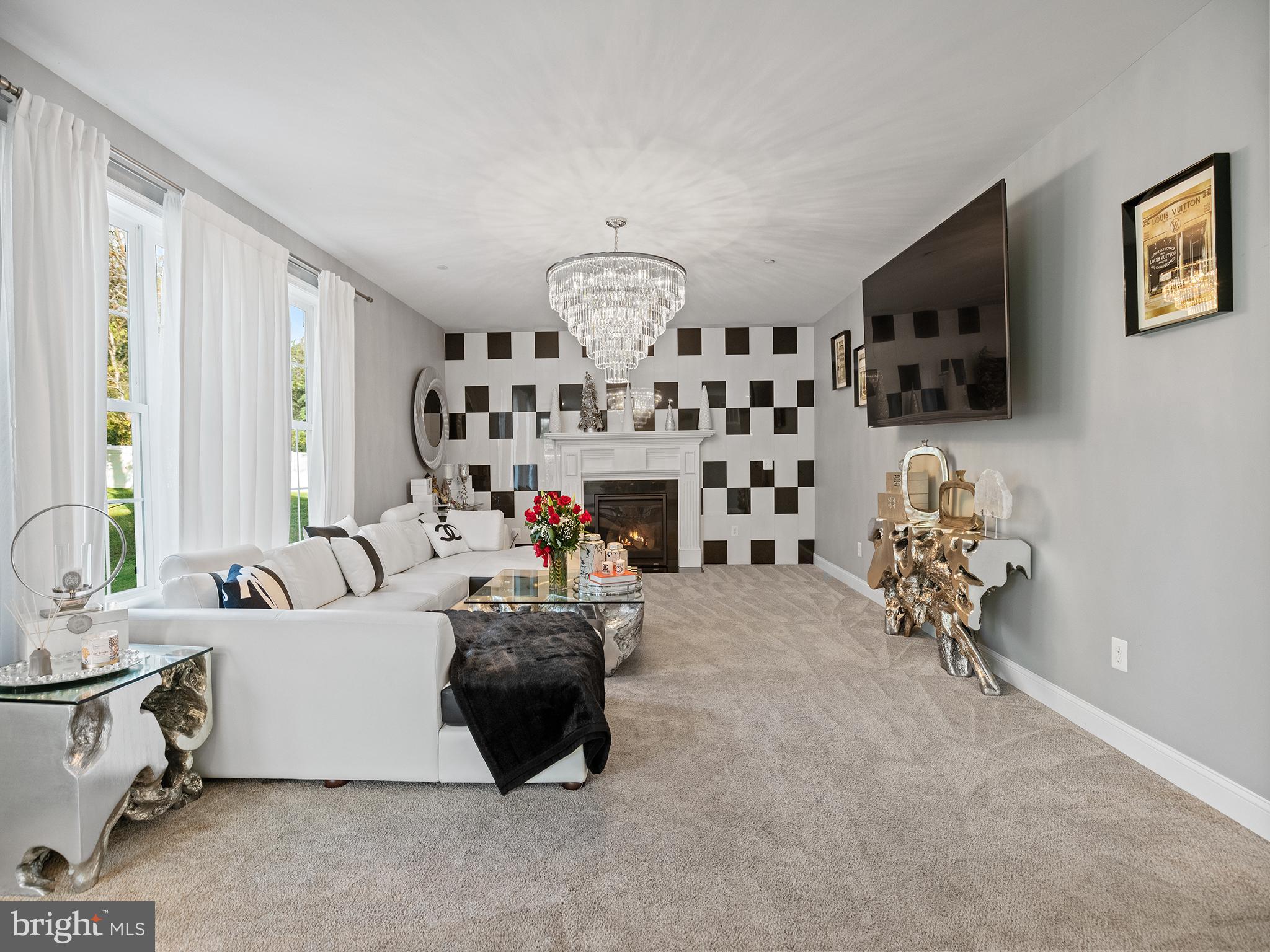 15935 Brackenburn Court Hughesville, MD 20637 - Photo 24 of 55 Accent wall with gas fireplace