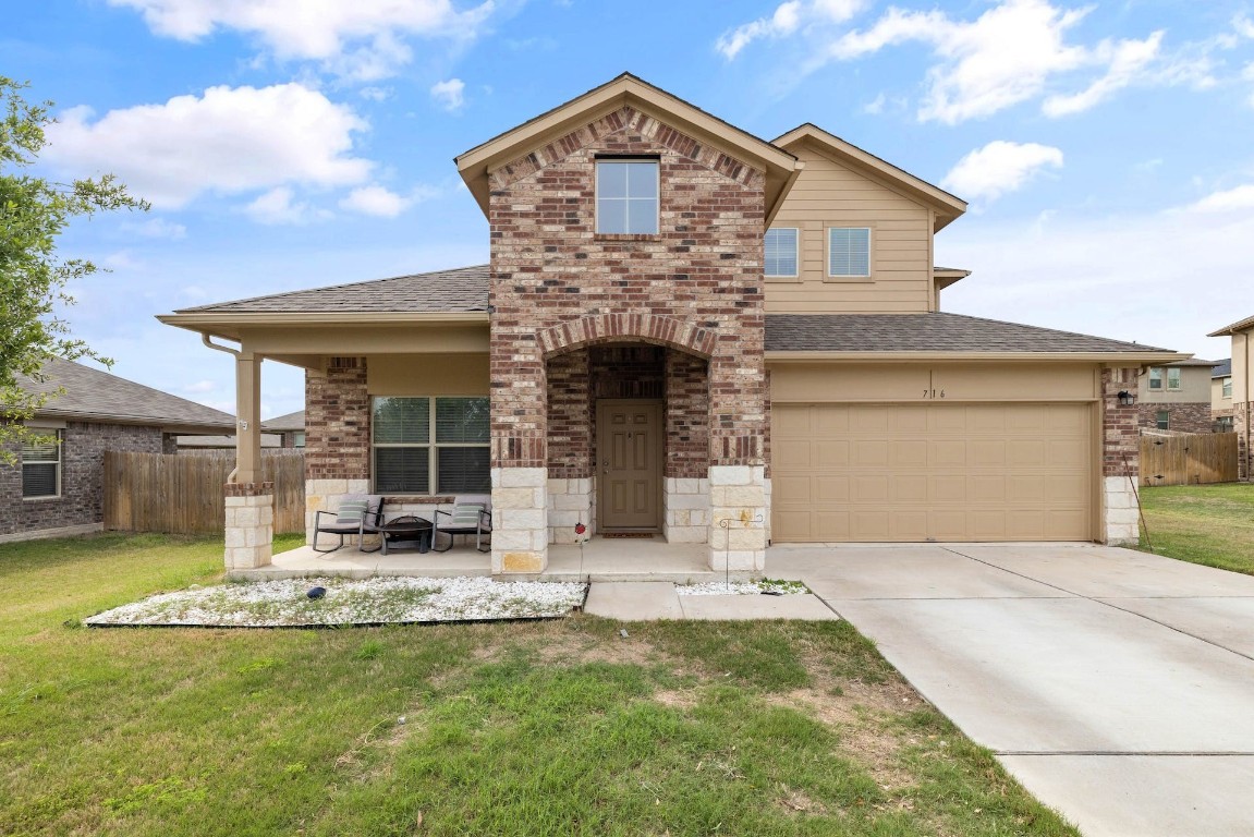 716 Kaluga Trail Leander, TX 78641 - Photo 1 of 1 a front view of a house with garden