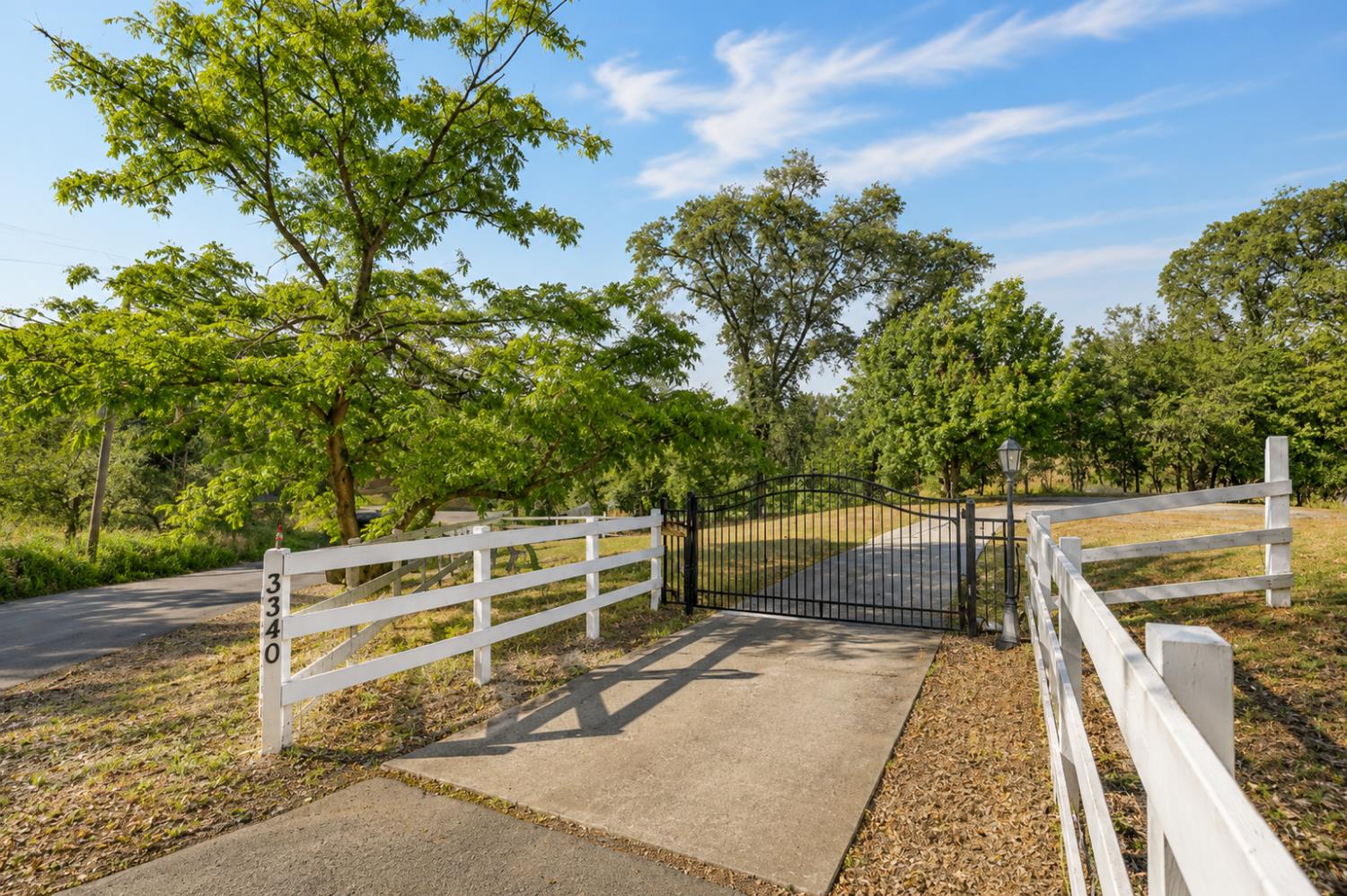 3340 Garden Bar Road Lincoln, CA 95648 - Photo 2 of 56 a view of a balcony with wooden floor and fence