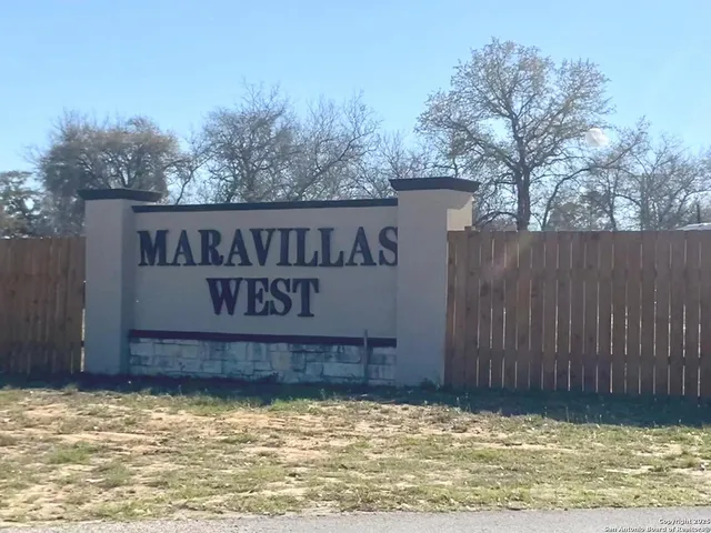 a sign that is sitting in front of a door