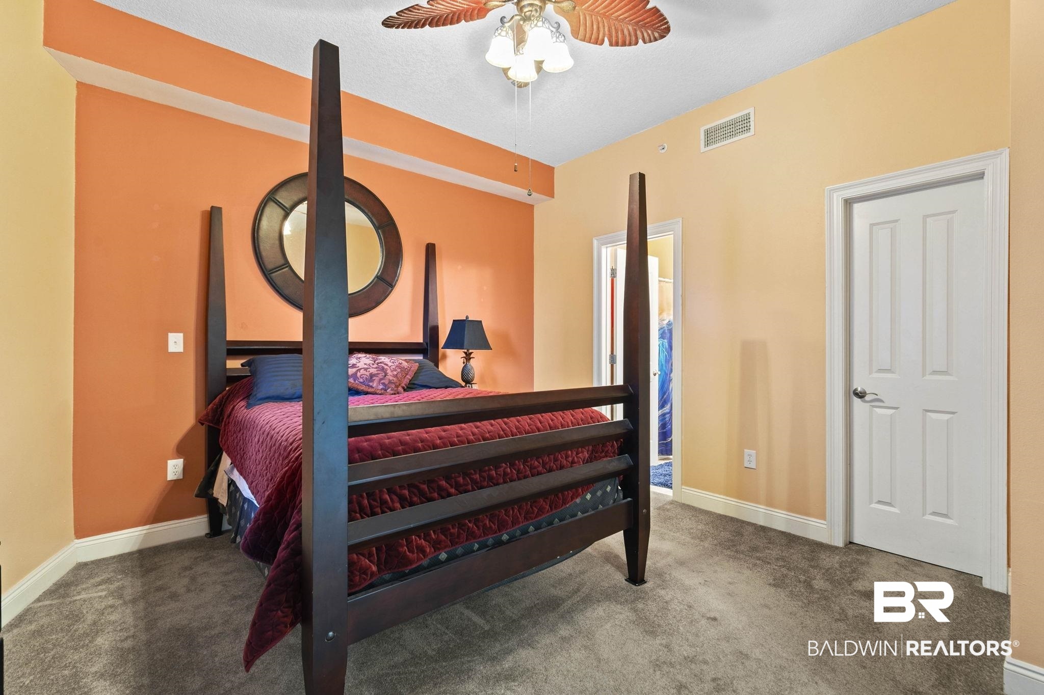 28250 Canal Road, Unit 208 Orange Beach, AL 36561 - Photo 40 of 53 Bedroom with dark carpet and a ceiling fan
