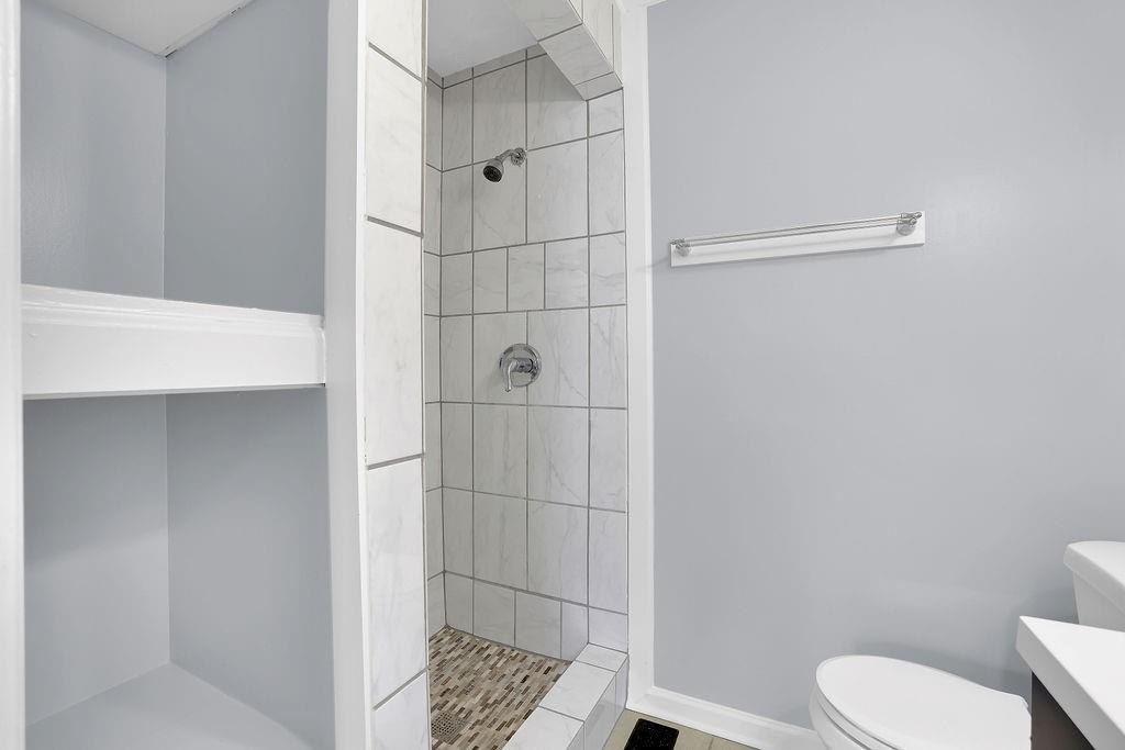 1424 Springleaf Circle Southeast Smyrna, GA 30080 - Photo 28 of 38 a bathroom with a shower and toilet