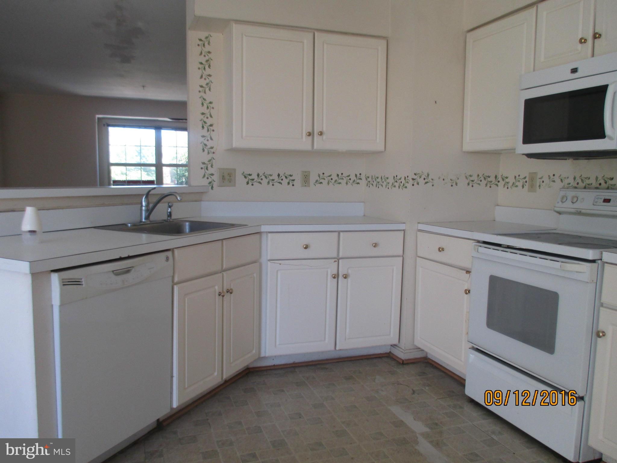 14208 Plum Run Way Silver Spring, MD 20906 - Photo 10 of 13 Kitchen