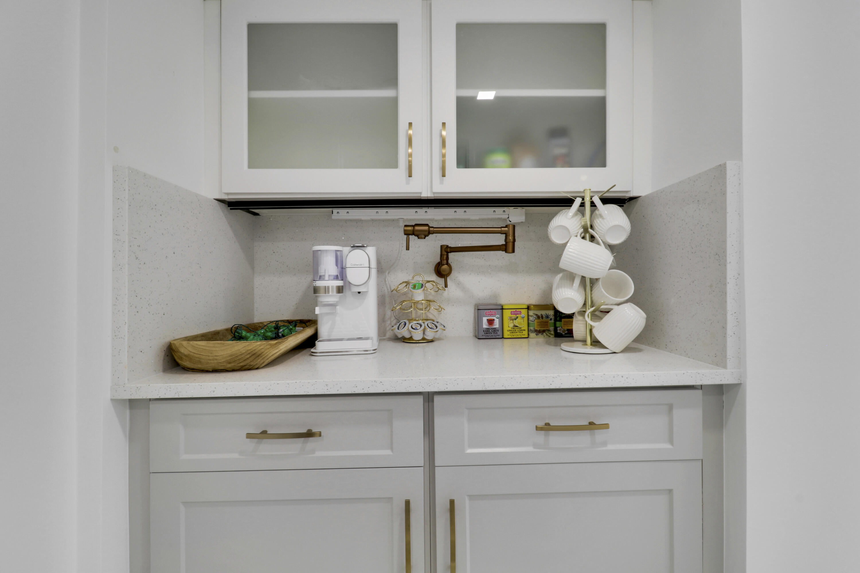 5280 North Ocean Drive, Unit 2F Riviera Beach, FL 33404 - Photo 12 of 35 a kitchen with a microwave and cabinets