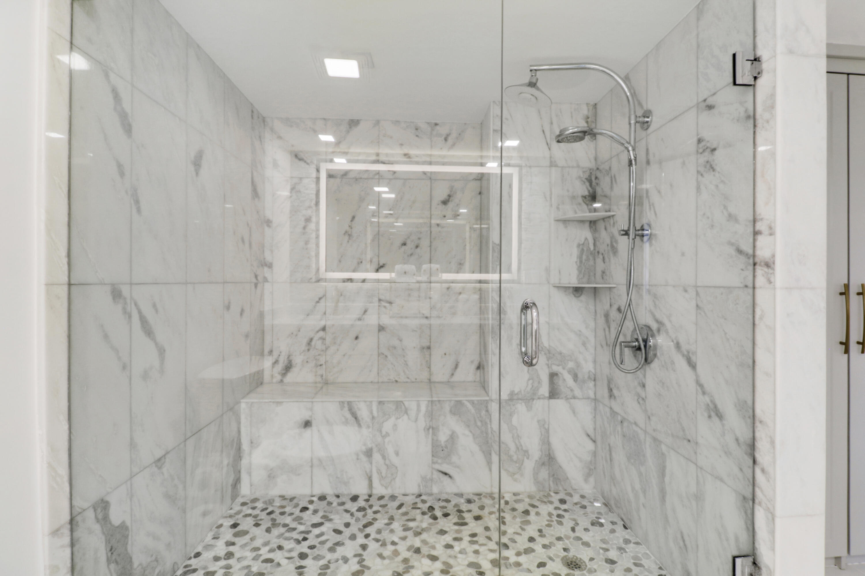 5280 North Ocean Drive, Unit 2F Riviera Beach, FL 33404 - Photo 16 of 35 a bathroom with a shower