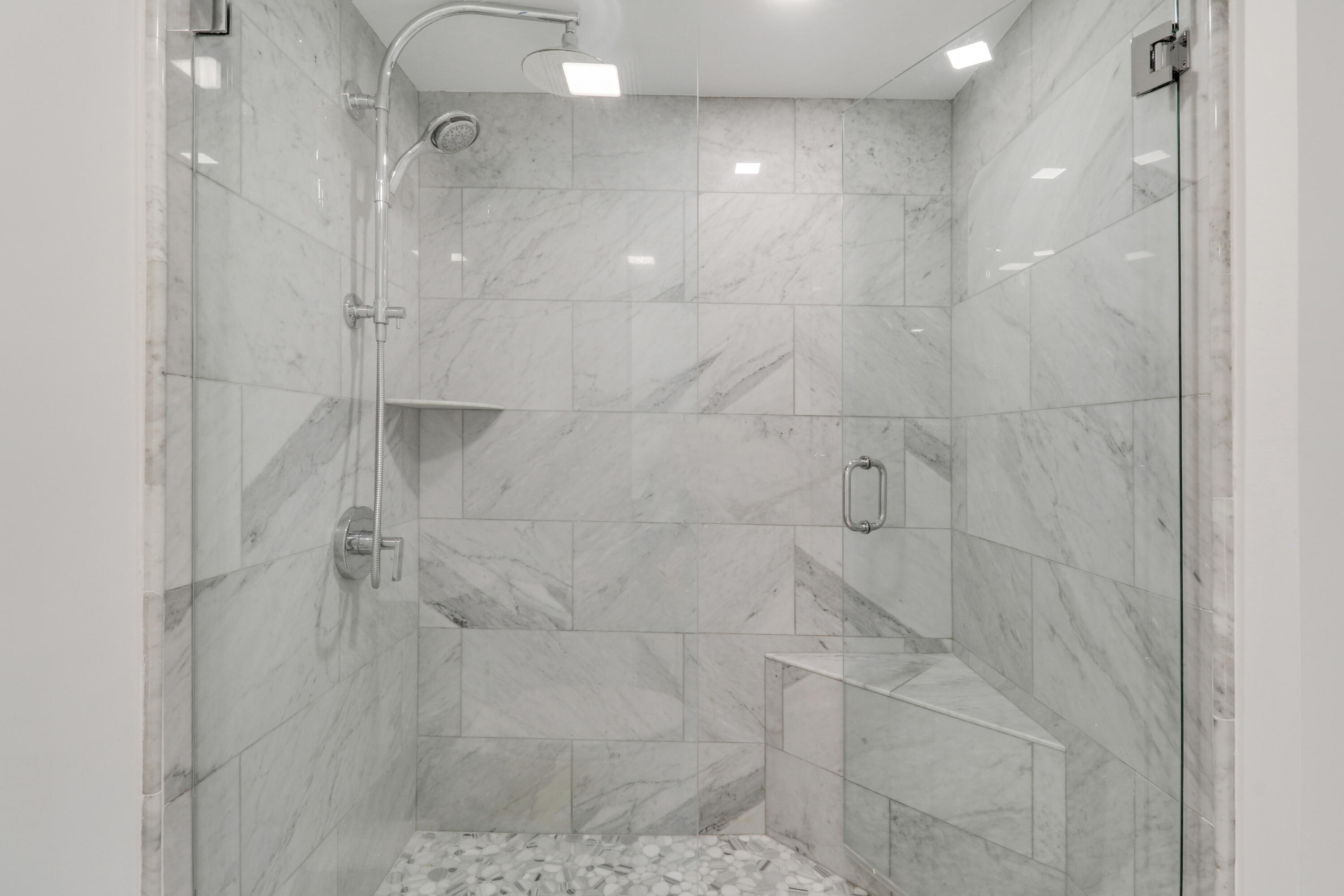 5280 North Ocean Drive, Unit 2F Riviera Beach, FL 33404 - Photo 22 of 35 a bathroom with a shower